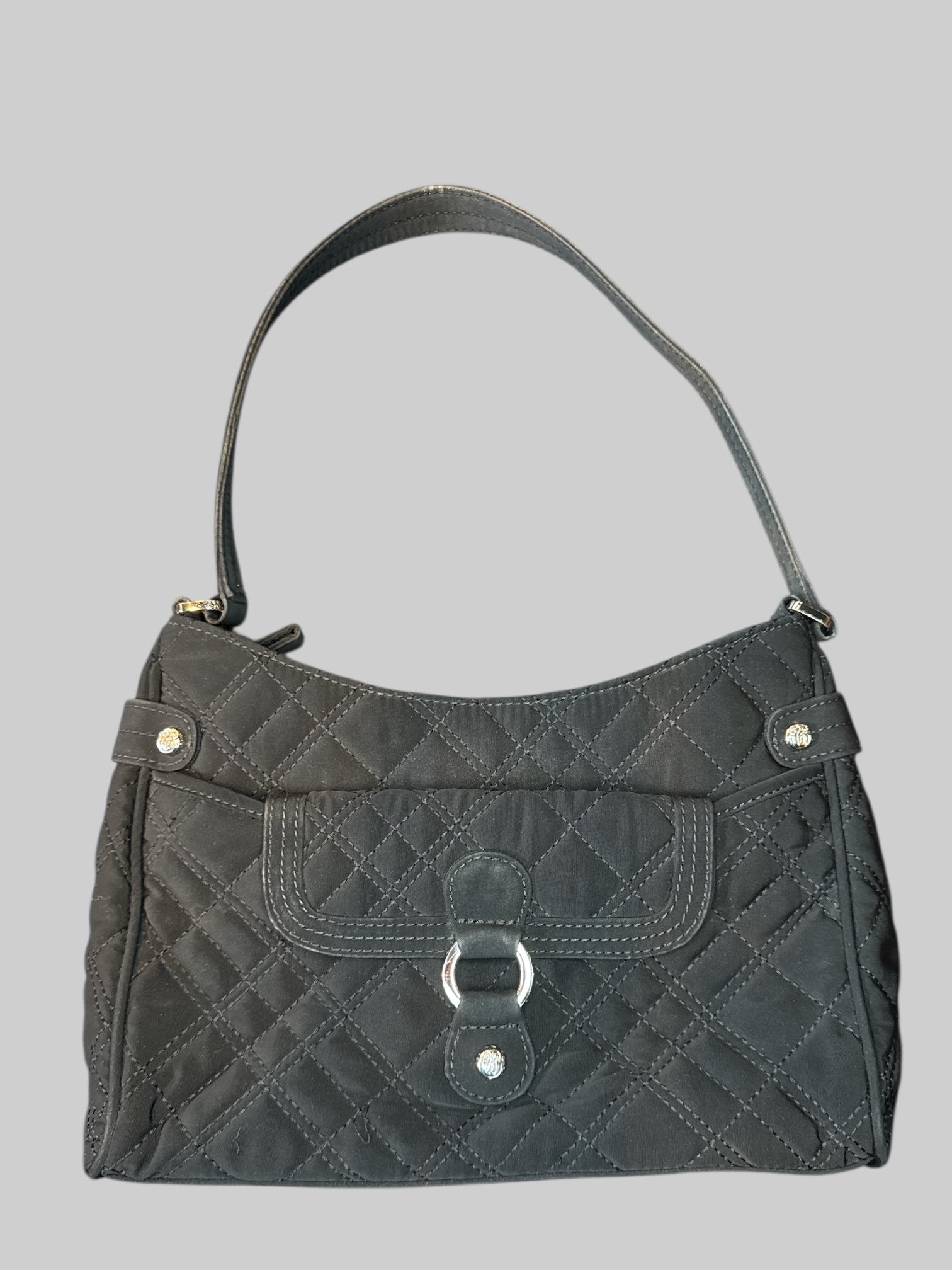 Black quilted bag with magnetic pocket on front, and zipper pocket on inside