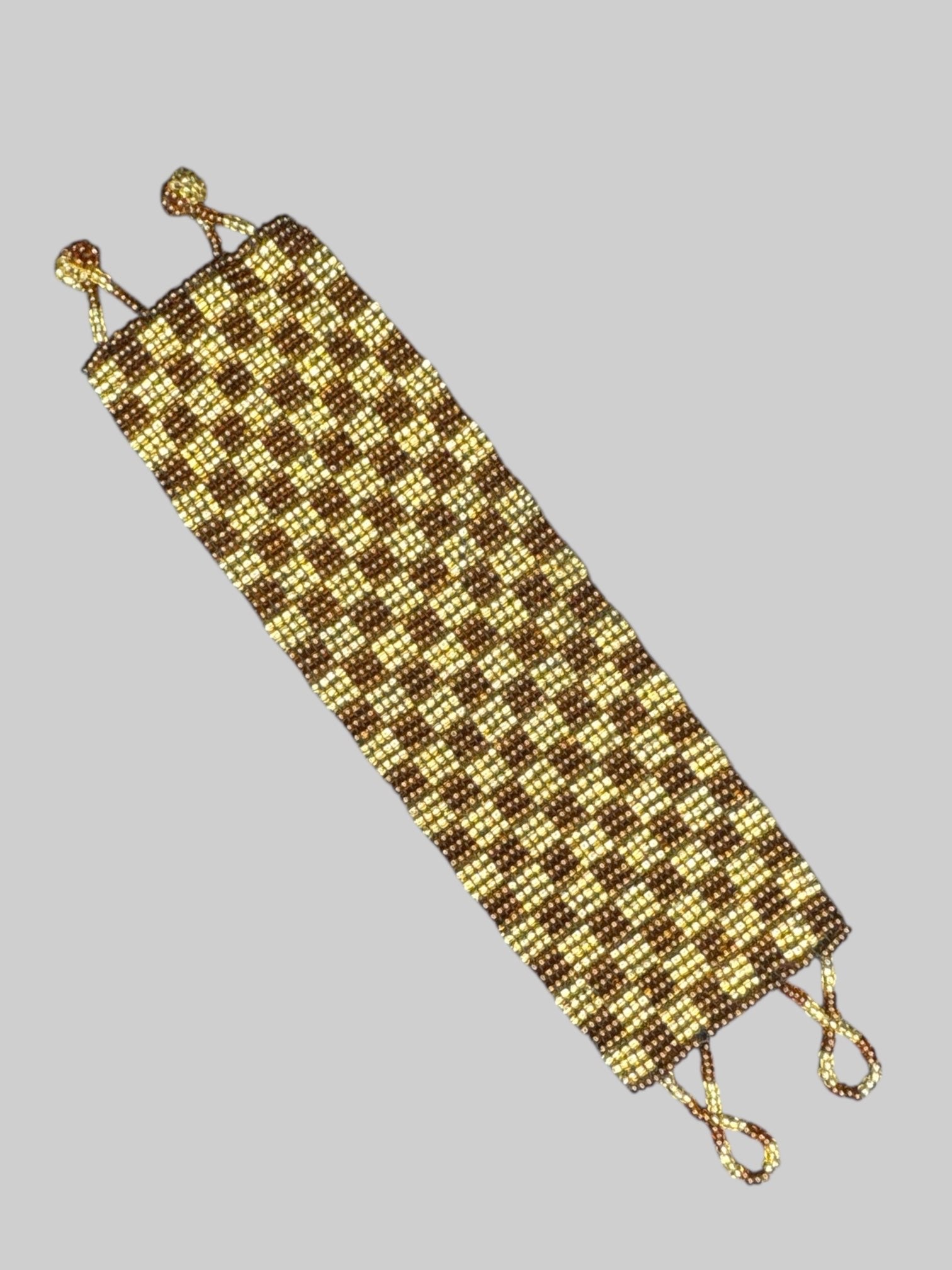 Brown and gold checkered beaded bracelet with ball clasp