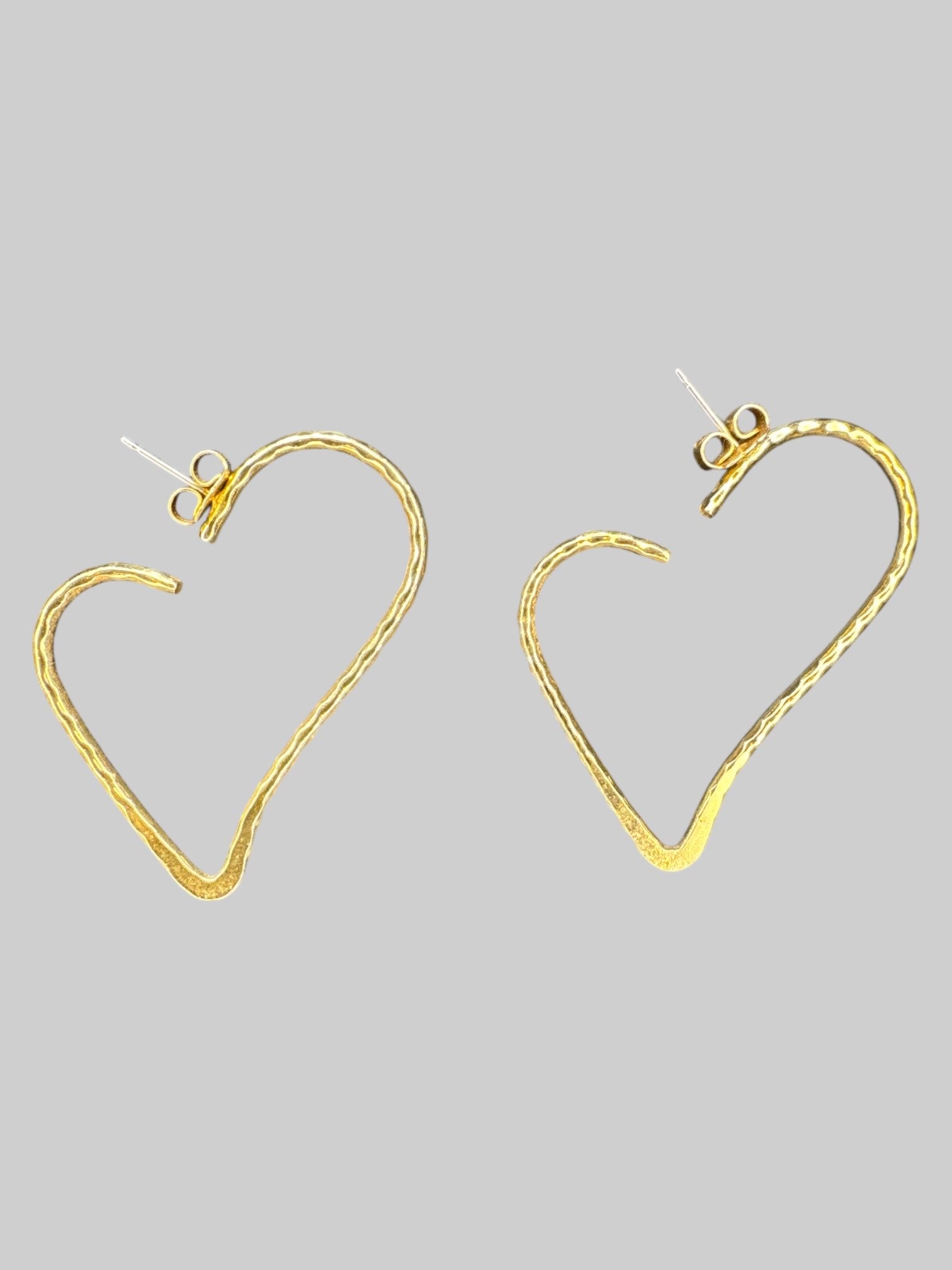 Gold tone heart shaped hoop earrings