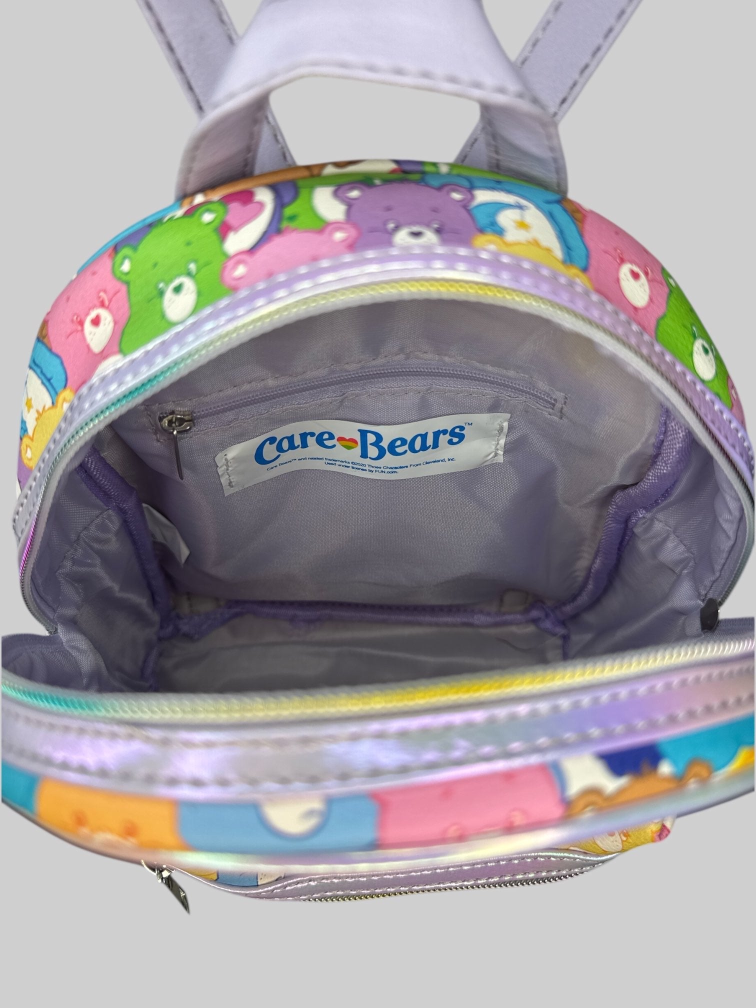 Multicolor Carebear mini backpack with purple adjustable straps