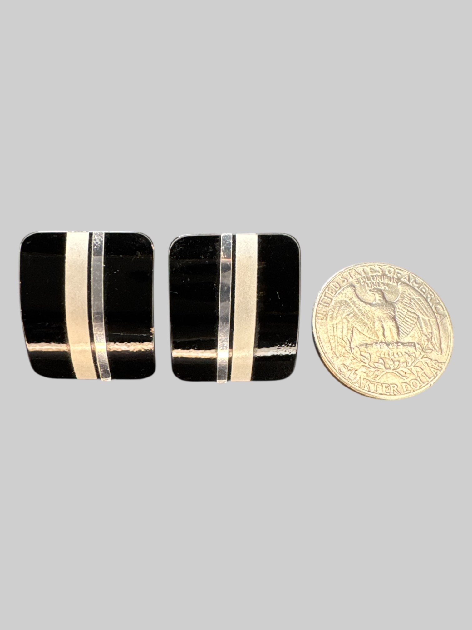 Vintage black shiny clip on earrings with silver and grey stripe