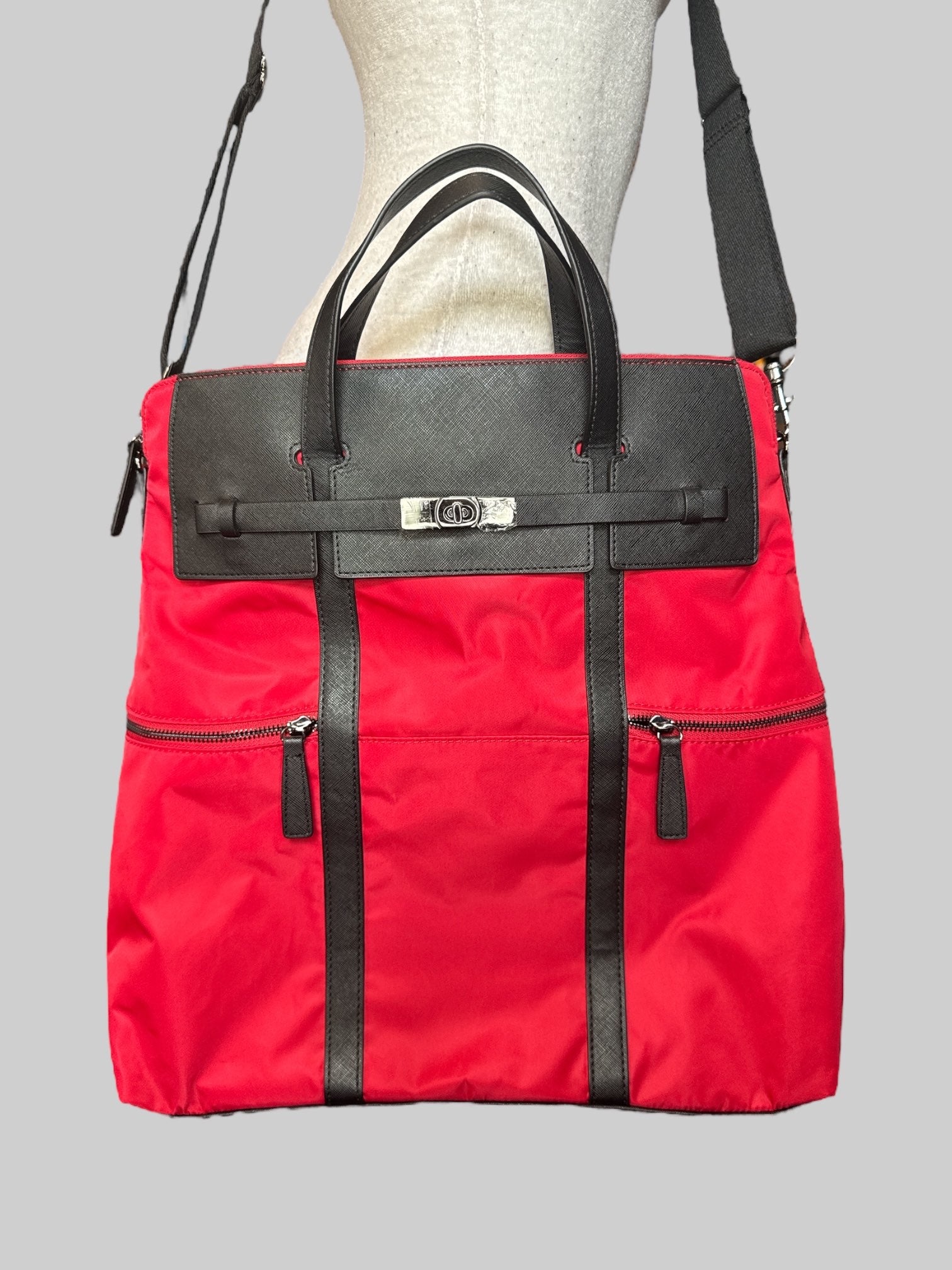 NWT Red large over the shoulder bag with decorative metal buckle, and multiple pockets inside and out