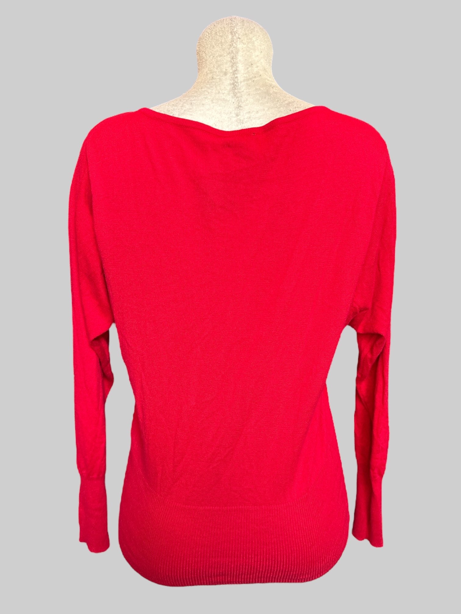 L Red sweater with rhinestone embellishments on chest