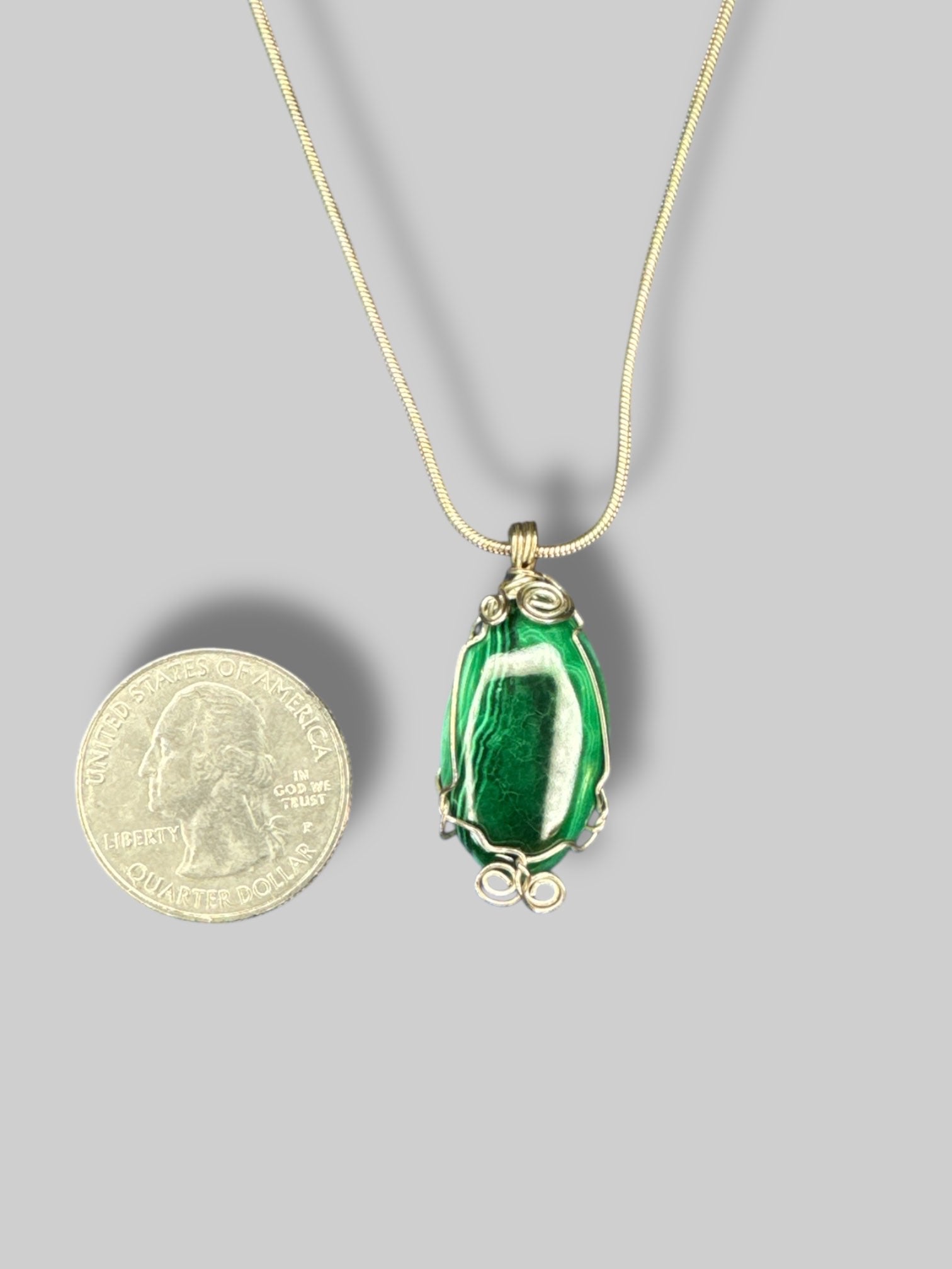 Sterling silver necklace with wire wrapped malachite