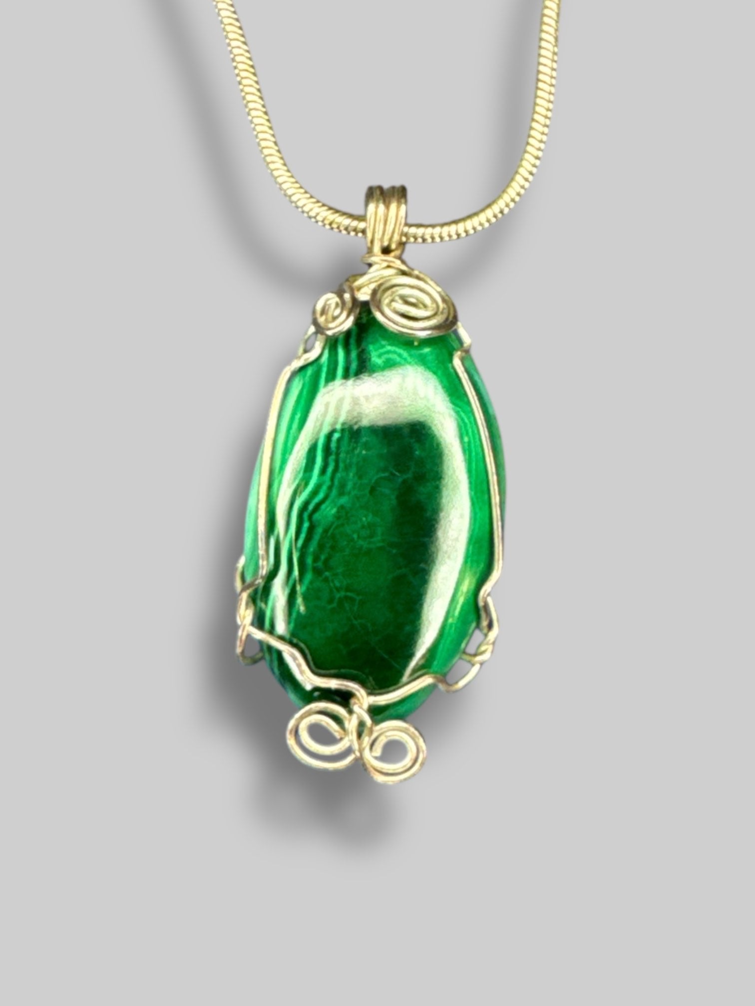 Sterling silver necklace with wire wrapped malachite