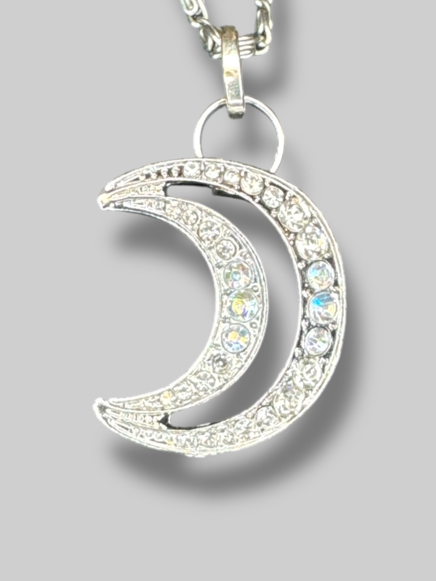 Silver tone necklace with Moon rhinestone pendant