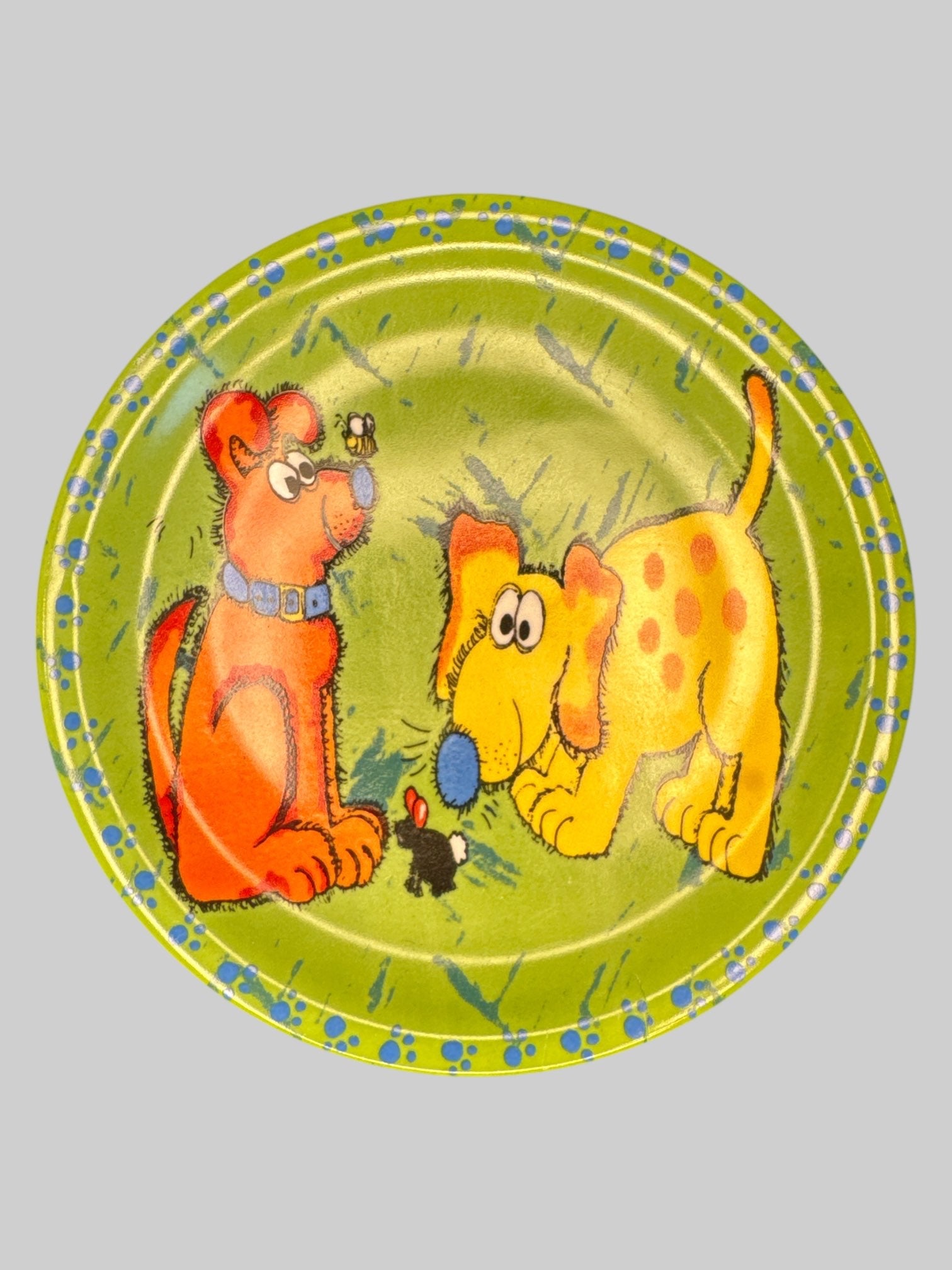 Green plate with cute cartoon dogs