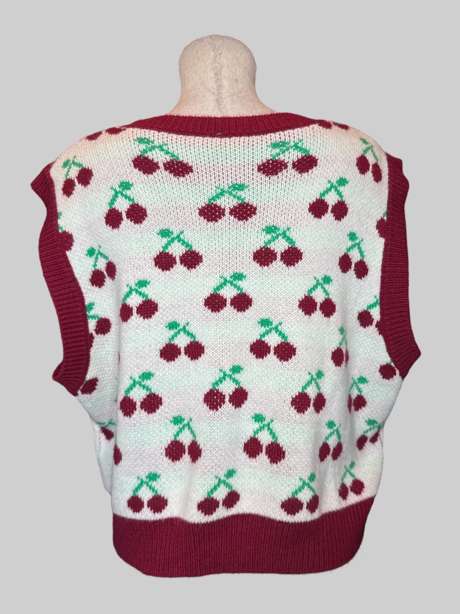2X White sweater vest with cherries and red trim