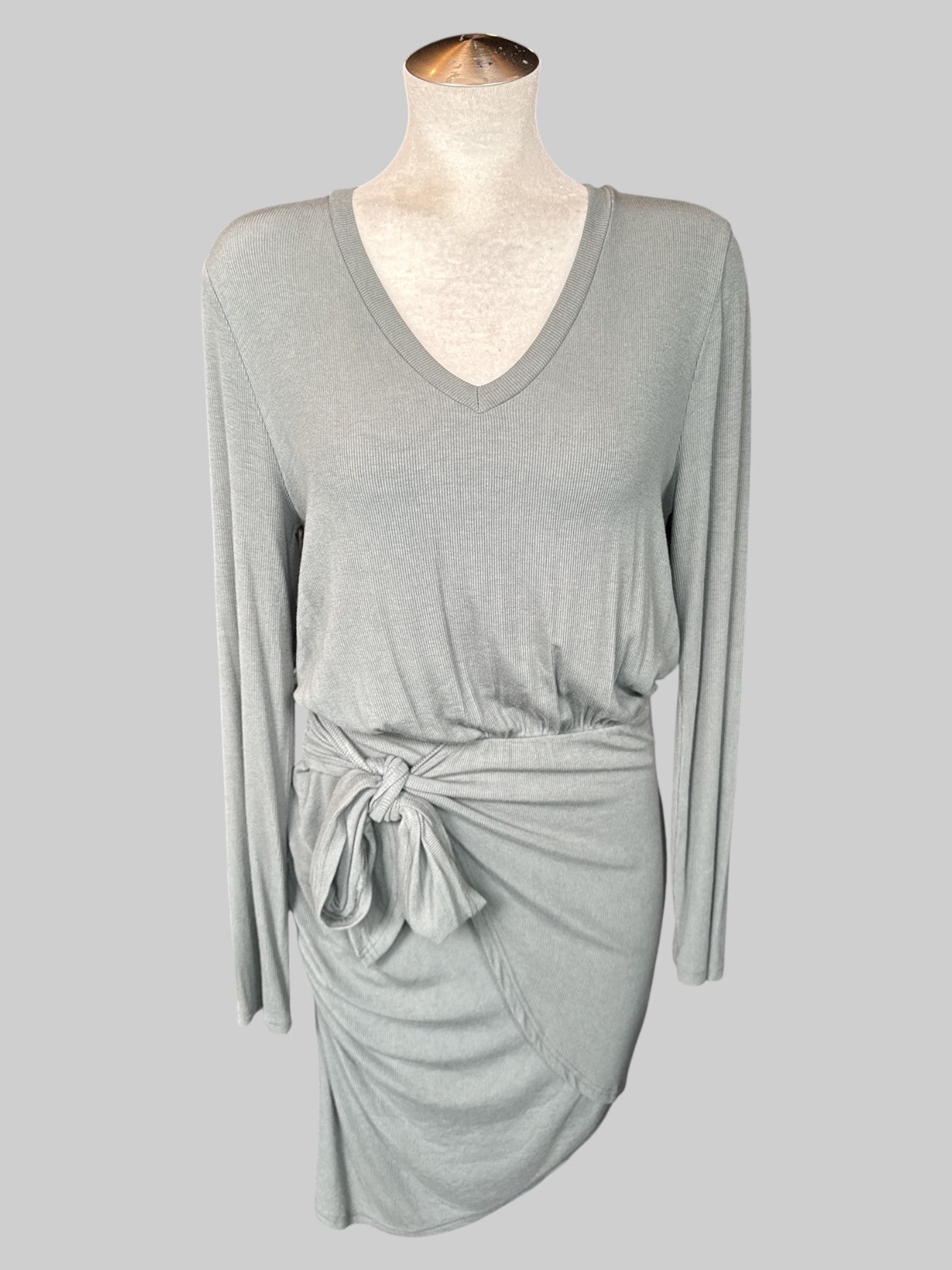 L Dusty green long sleeve dress with tie on front, asymmetrical hem, and ribbed texture