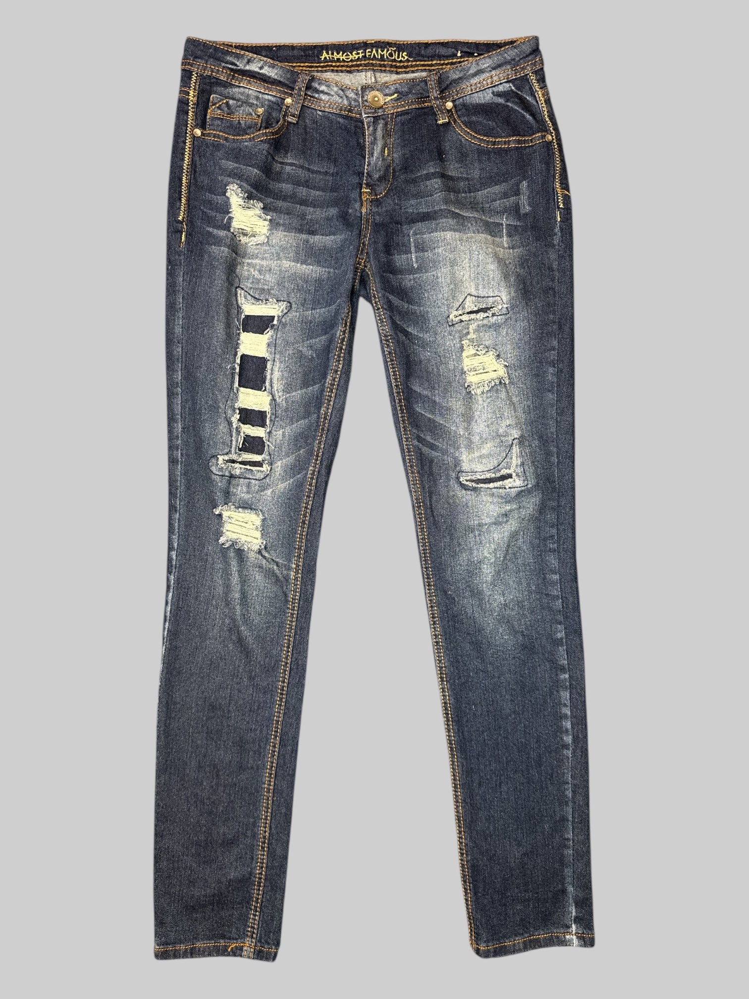 L Blue denim pants with intentional, distressing, orange and gold, threading, pockets, and belt loops