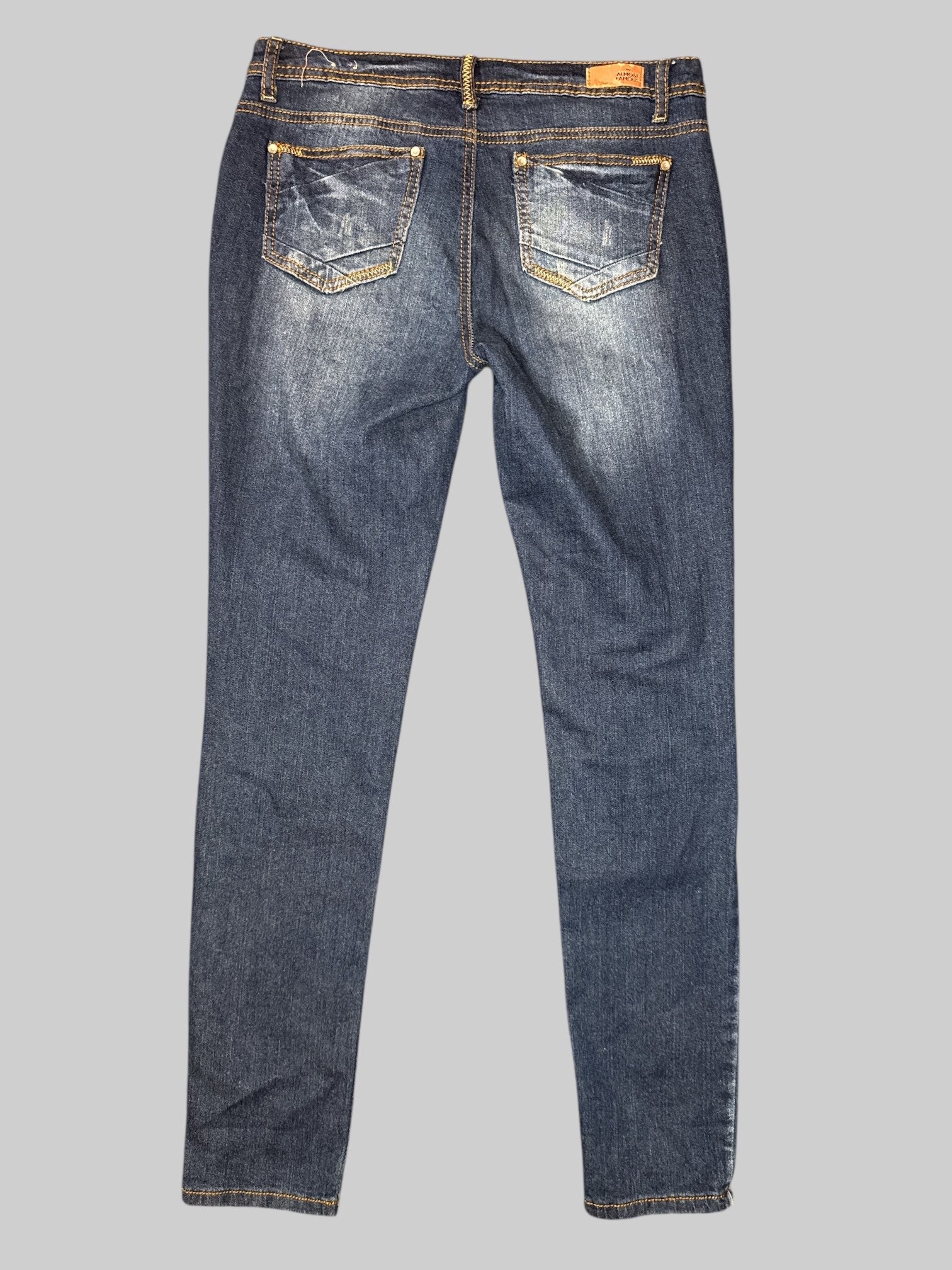 L Blue denim pants with intentional, distressing, orange and gold, threading, pockets, and belt loops