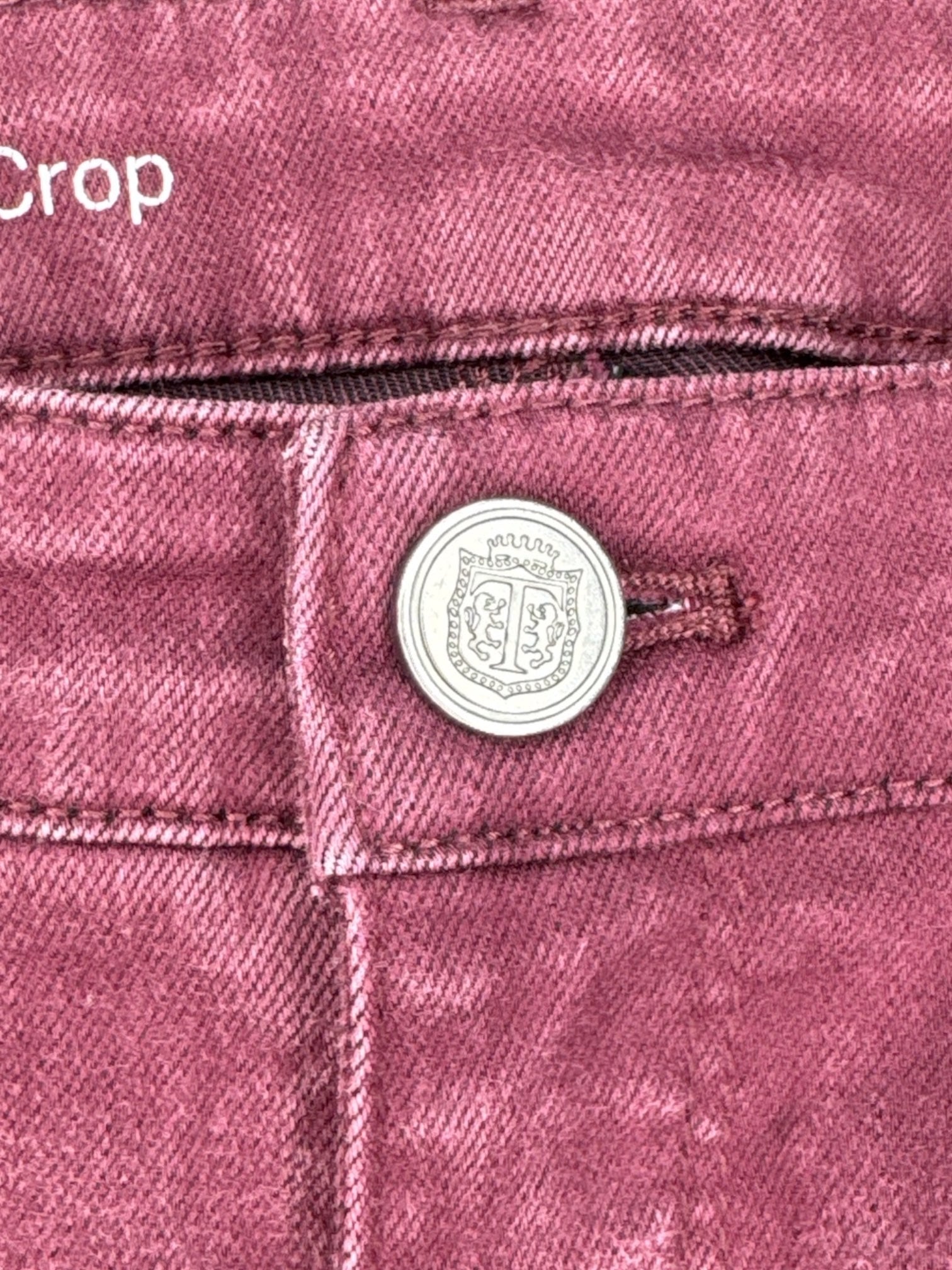 M Maroon pants with pockets, belt, loops, and button with crest