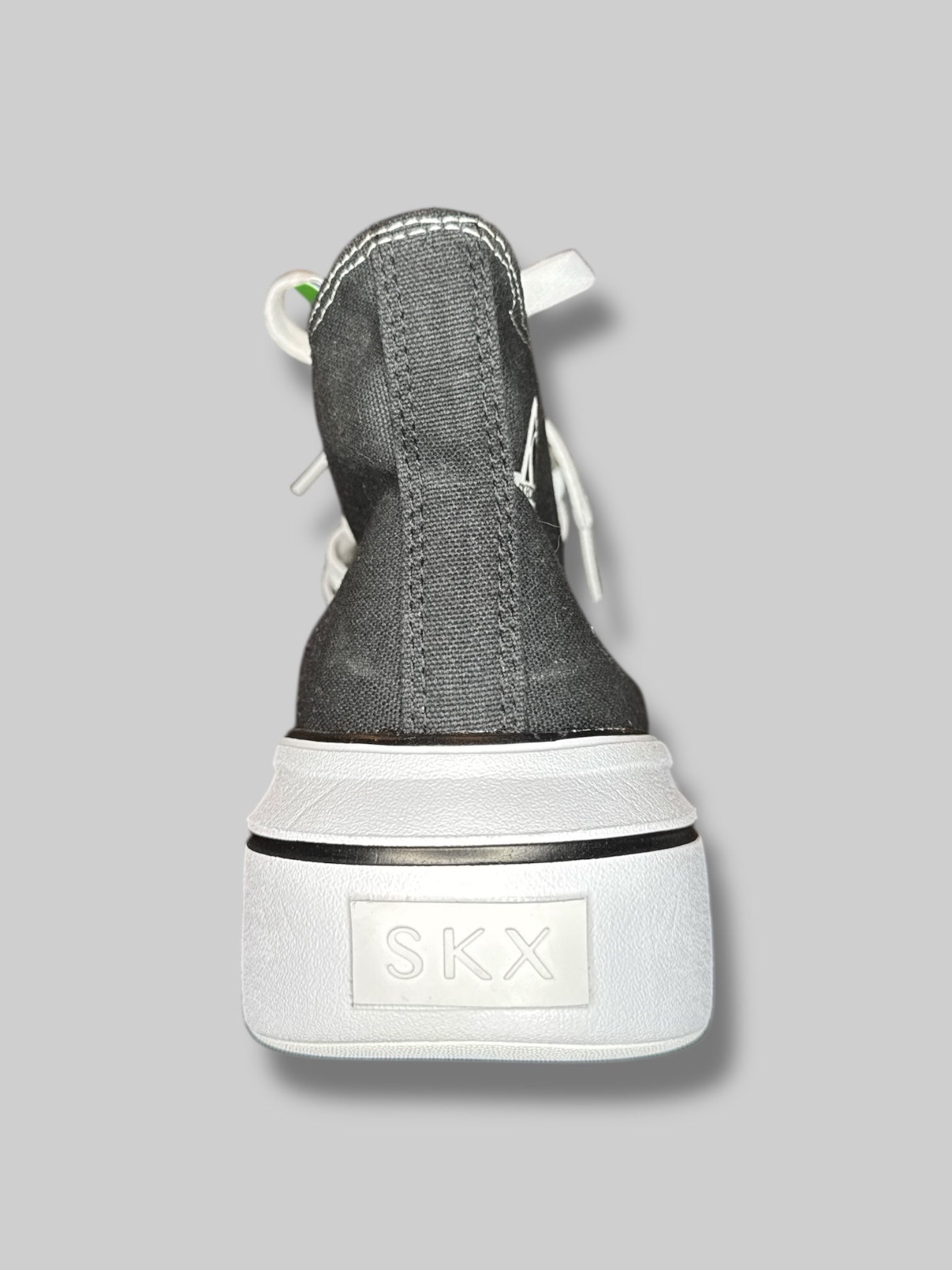 Size 9.5 NWT women’s black high top platform sneakers with black laces attached