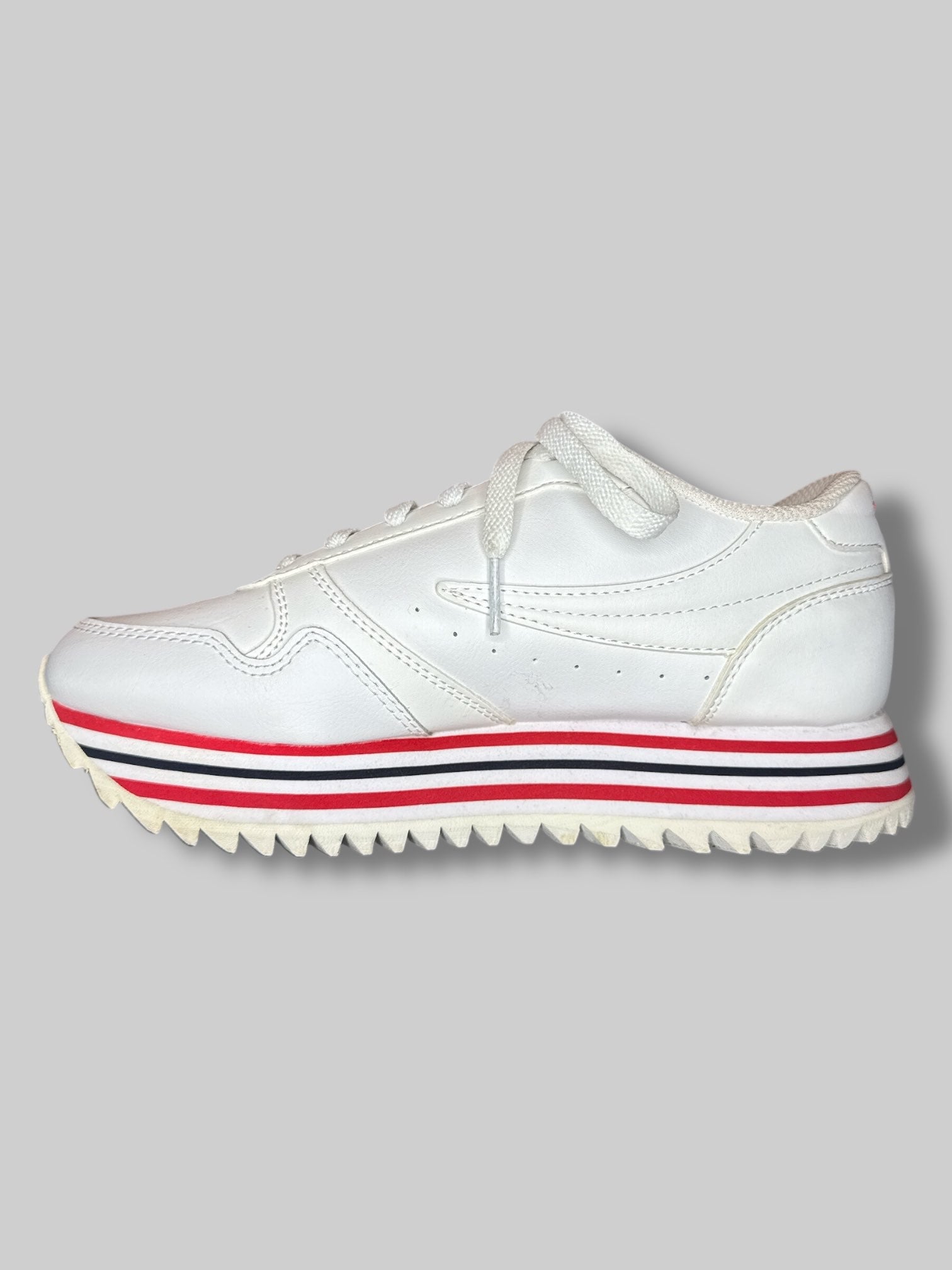 Size 7 women’s white platform FILA sneakers