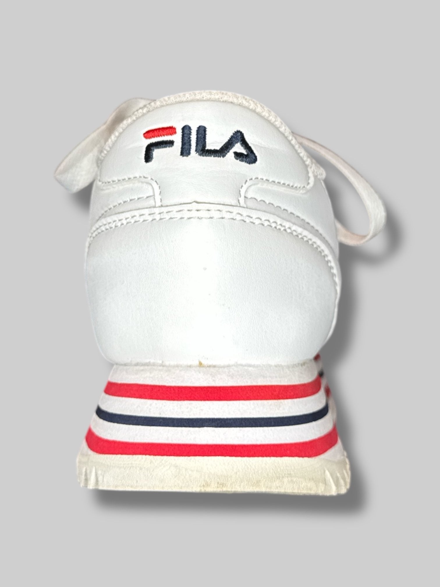 Size 7 women’s white platform FILA sneakers
