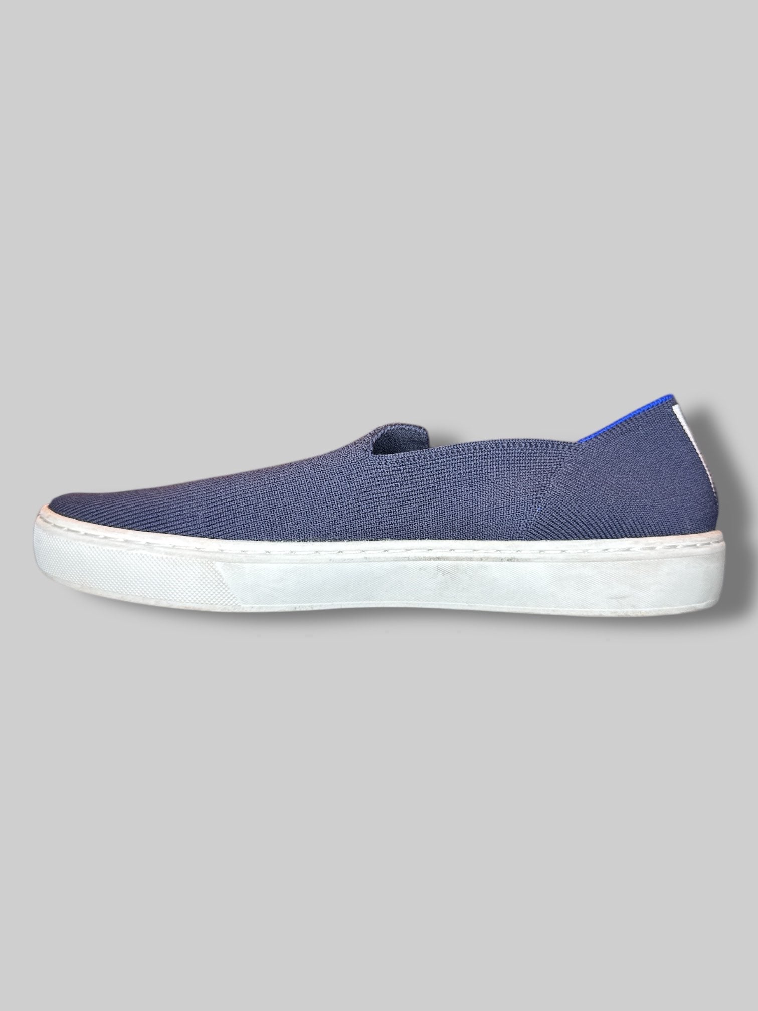 Size 8 1/2 women’s Rothy’s navy blue stretchy shoes with blue and white stripes on back