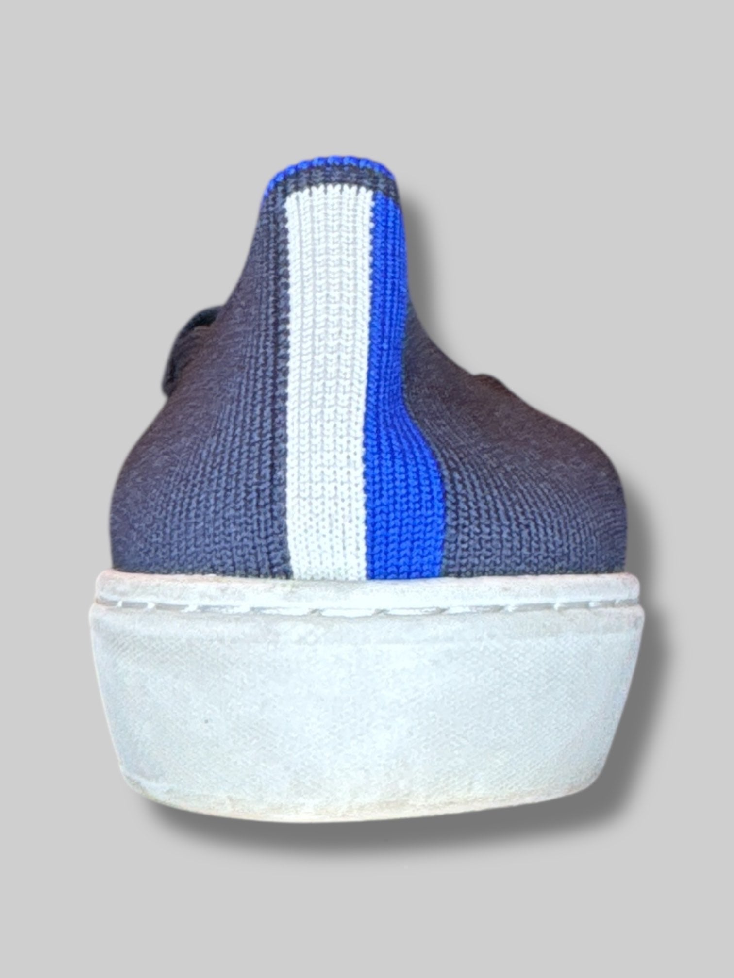 Size 8 1/2 women’s Rothy’s navy blue stretchy shoes with blue and white stripes on back