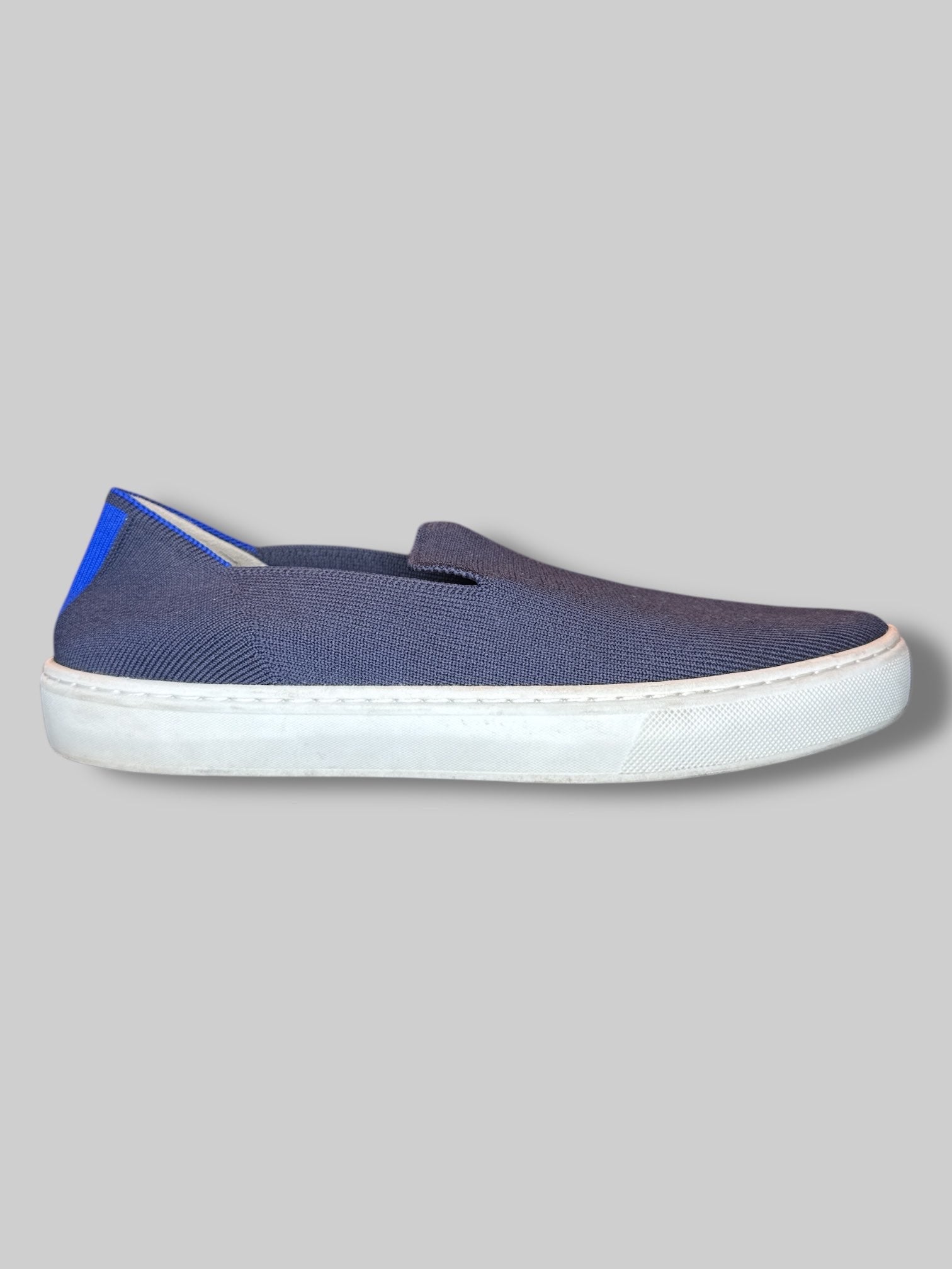 Size 8 1/2 women’s Rothy’s navy blue stretchy shoes with blue and white stripes on back