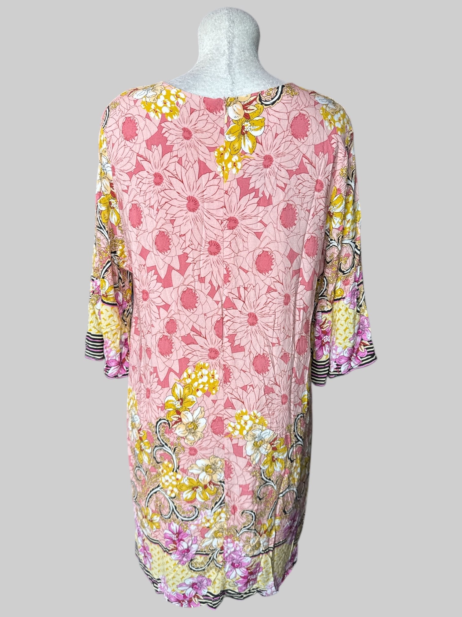 XL Pink floral dress with yellow and black floral ornate design on bottom, and zipper on back
