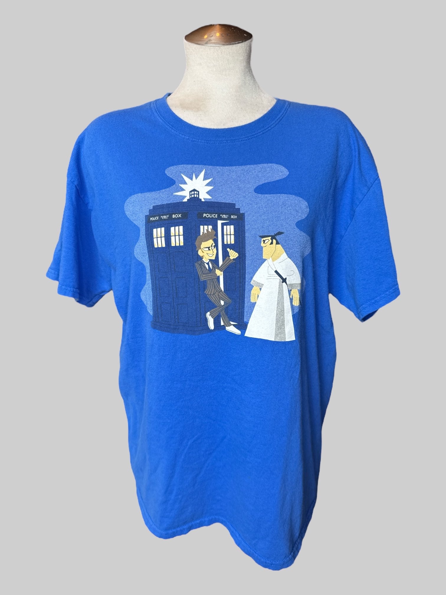 L Blue tee with Doctor Who and Samurai Jack graphic