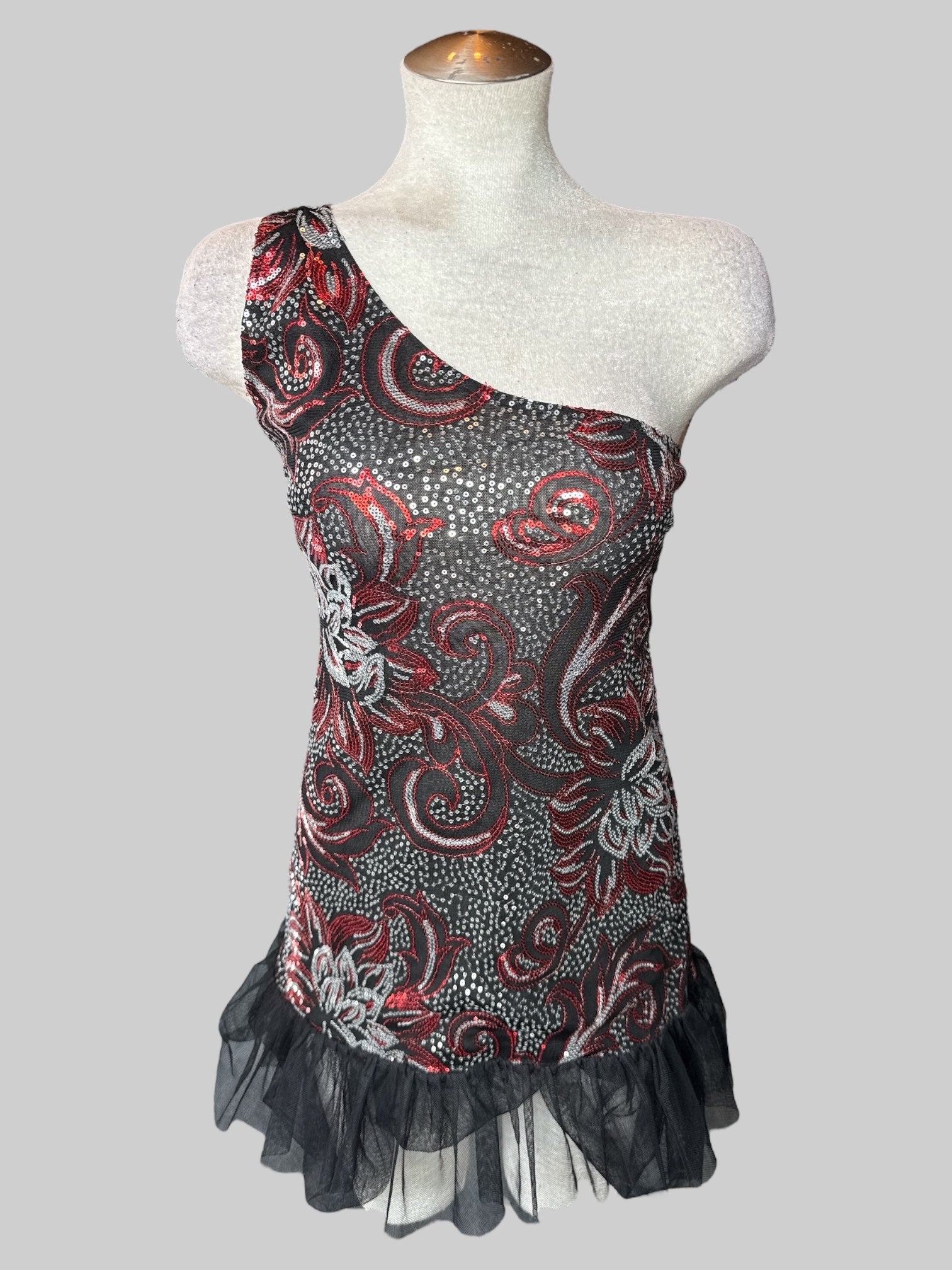 M Black sheer one shoulder dress with ruffles on bottom, red and silver sequin design