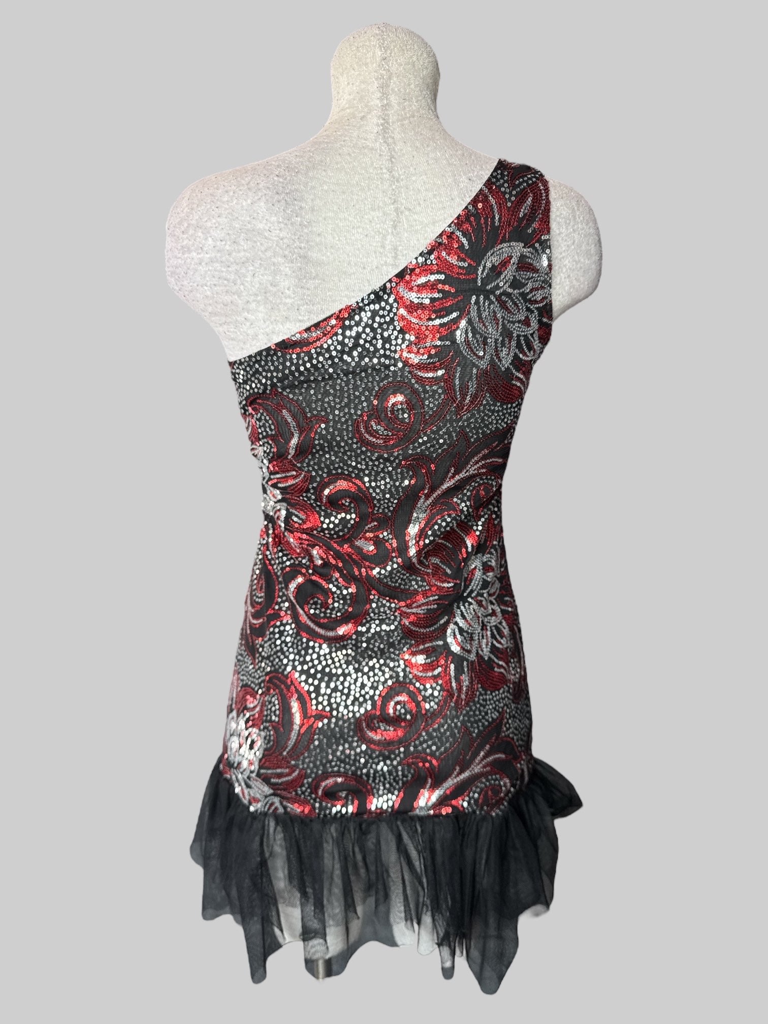 M Black sheer one shoulder dress with ruffles on bottom, red and silver sequin design