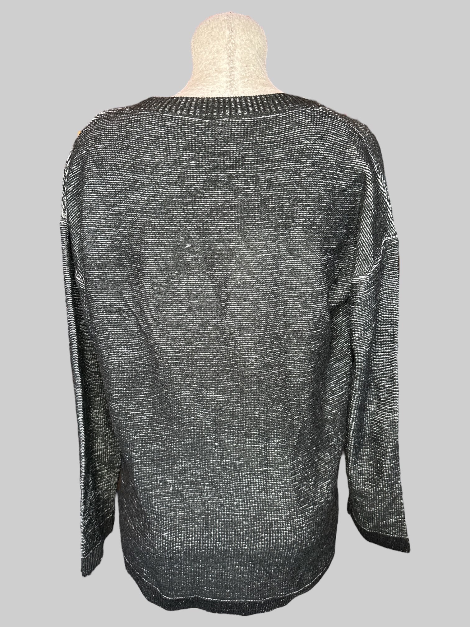1X Black and white sweater with skeleton hand crossing fingers embroidery