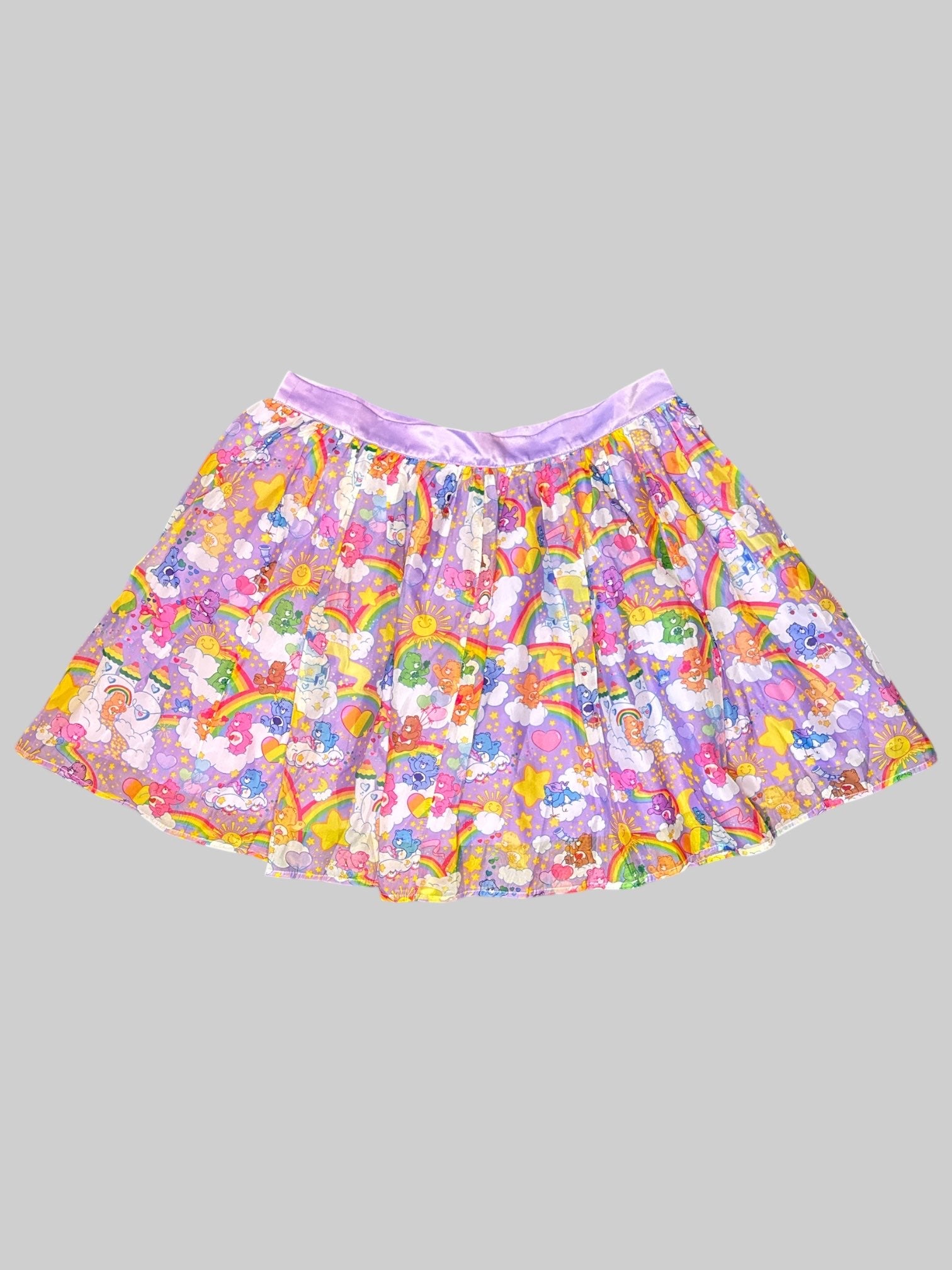 L Purple flowy Carebear skirt with pockets, and button and zipper on back