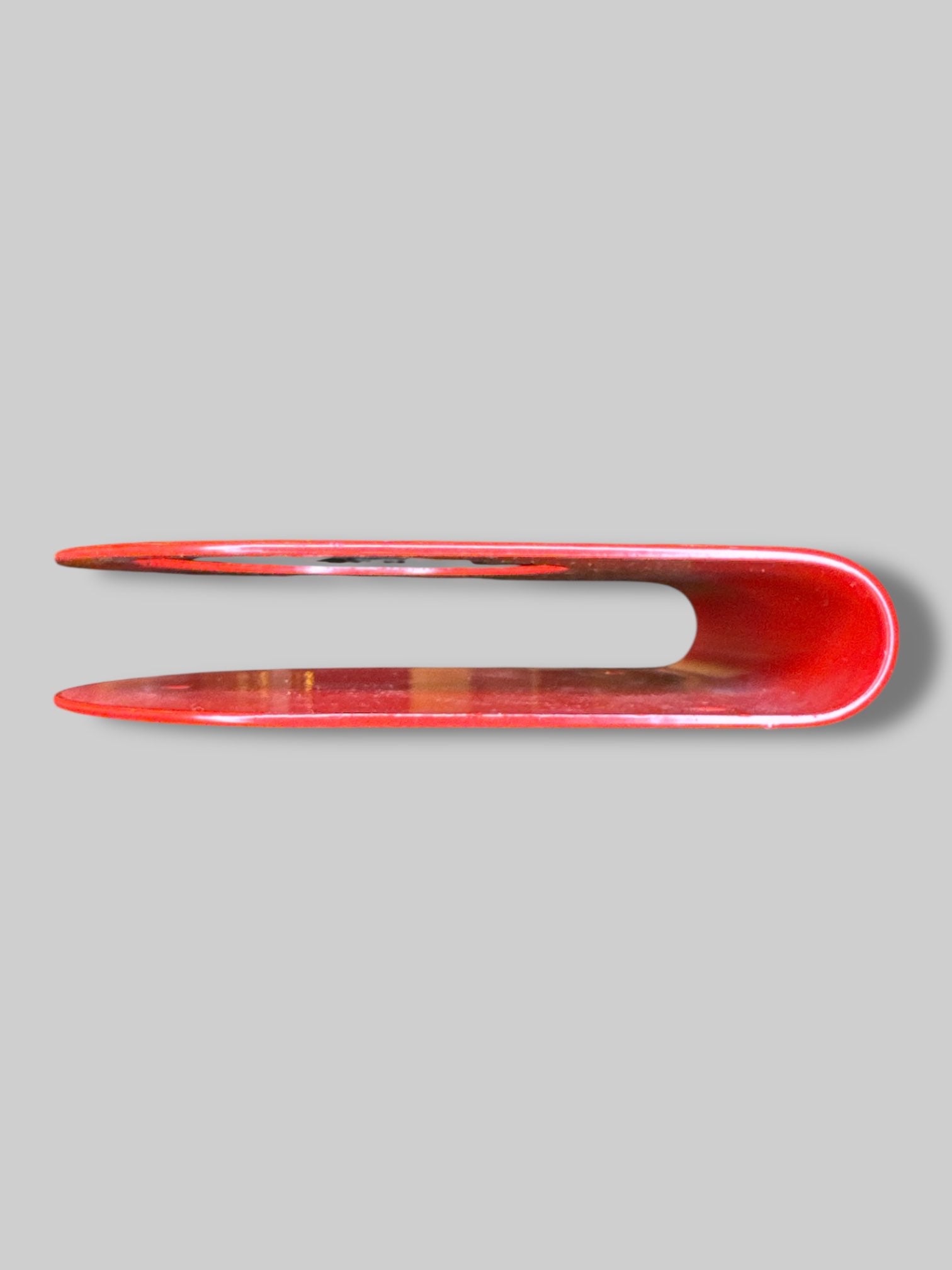 Large red metal candle holder