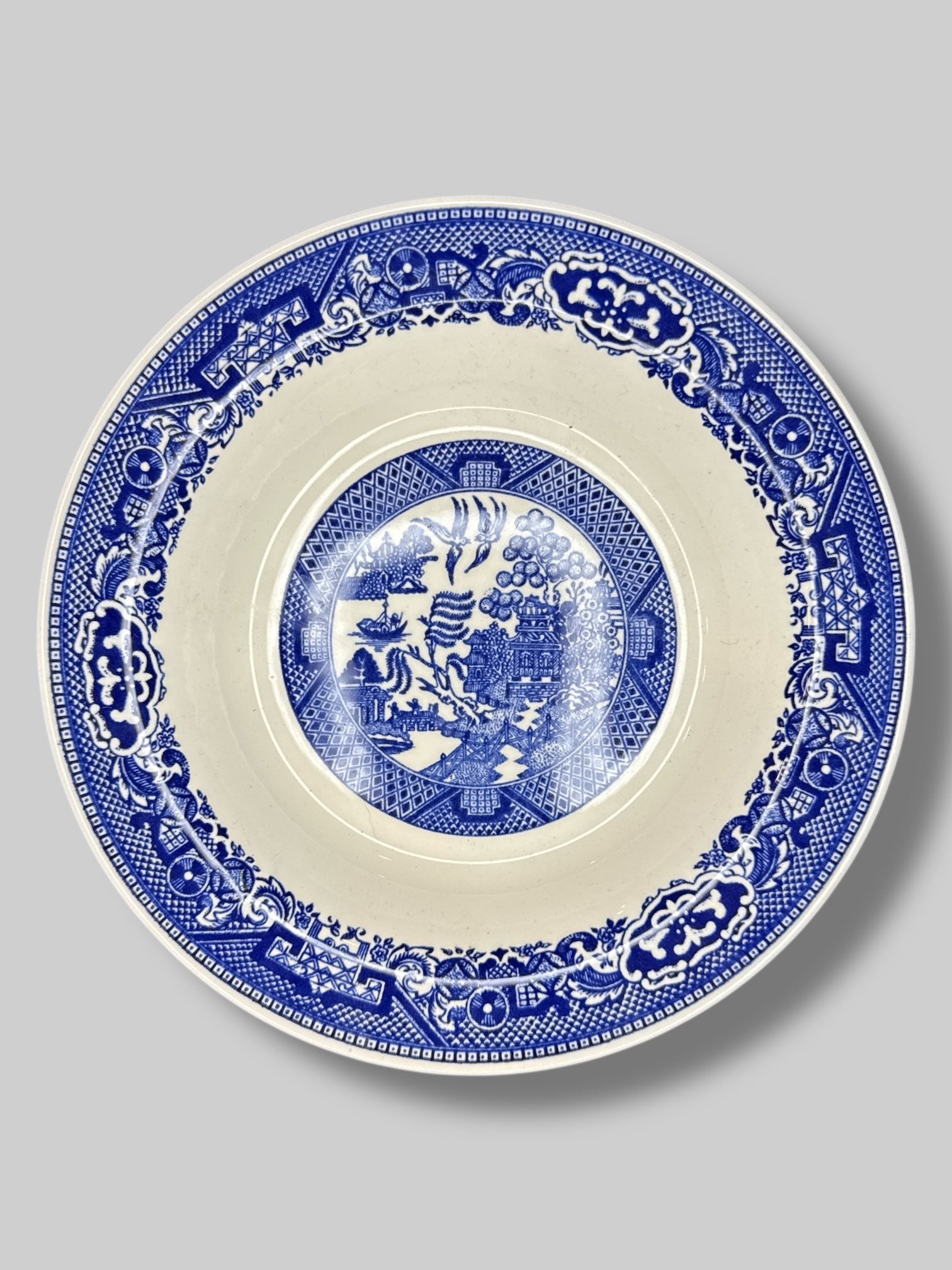 Willow Ware China bowl with blue ornate design