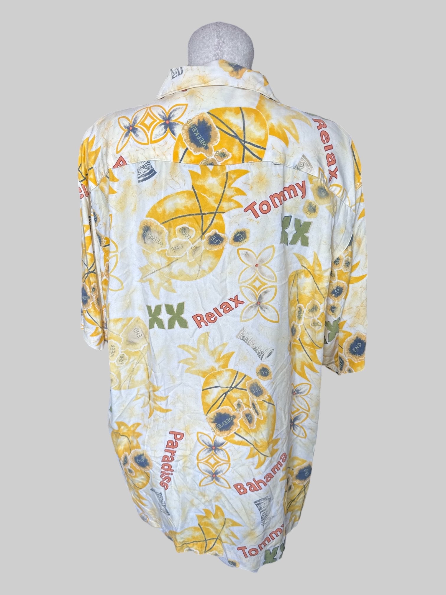 XL Vintage light yellow short sleeve button down with tropical “Tommy Bahama “graphic, and chess pocket