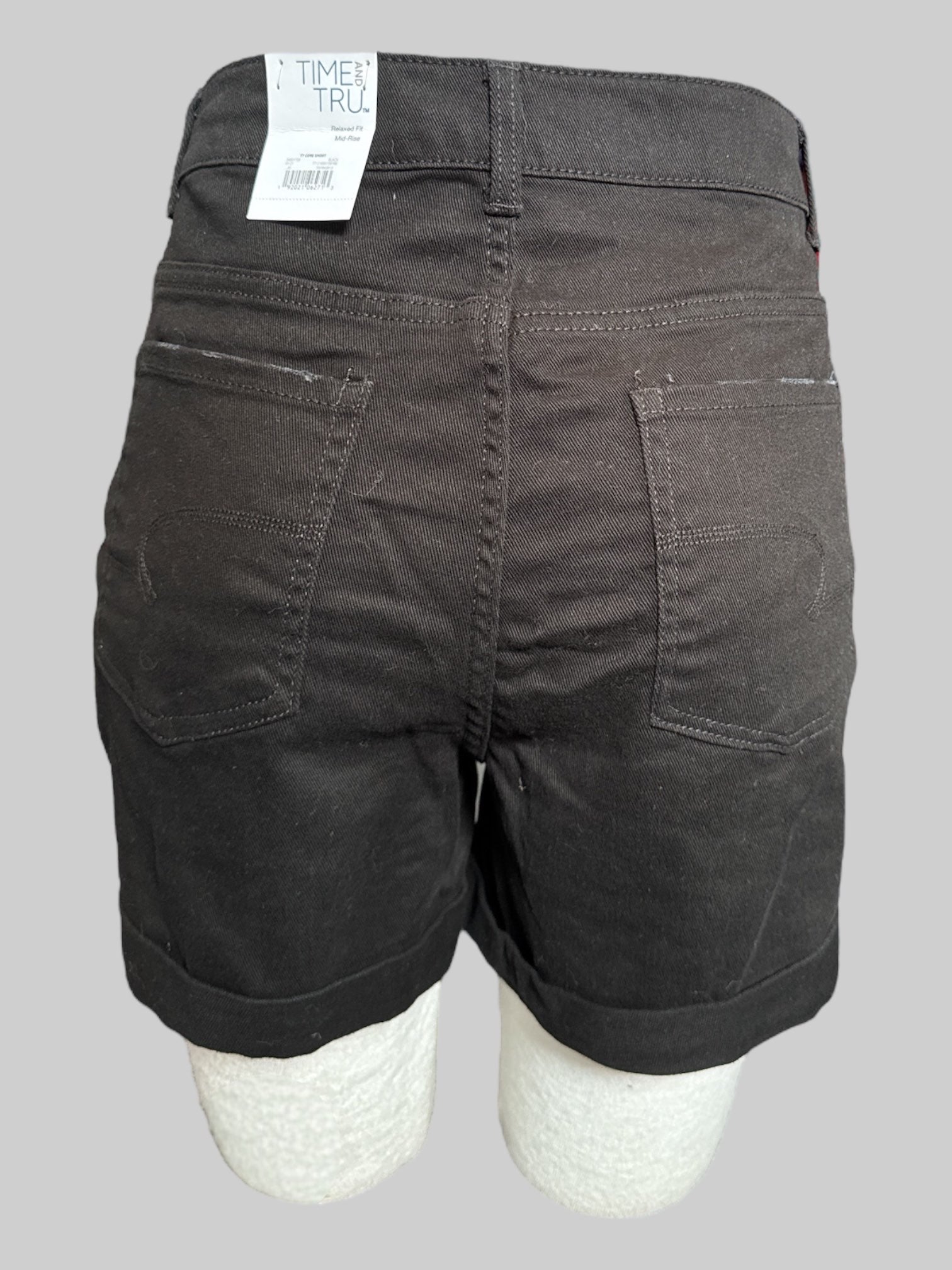 L NWT black mid rise short with 4” inseam
