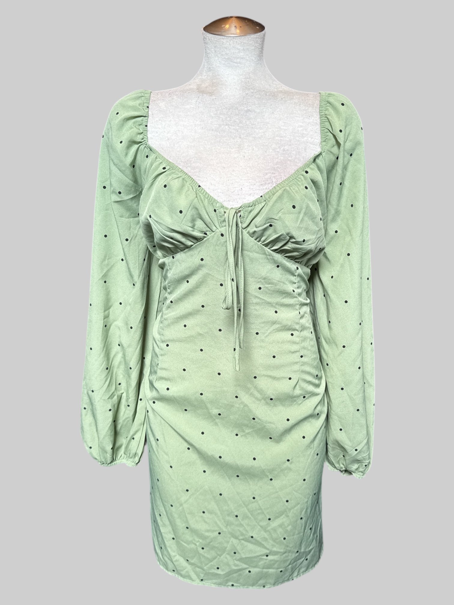 1X Green dress with black polka dots, balloon sleeves, and tie in front