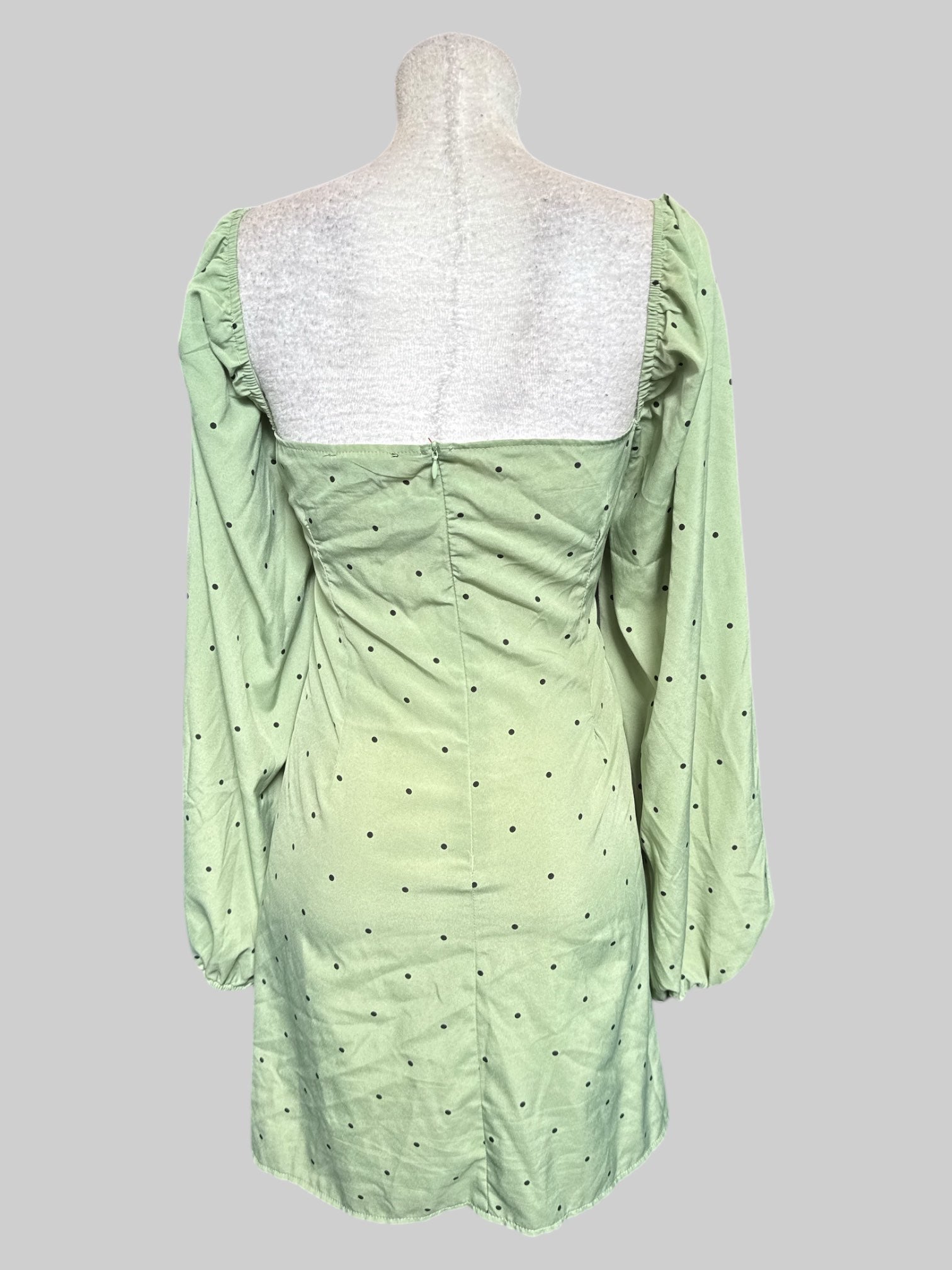 1X Green dress with black polka dots, balloon sleeves, and tie in front