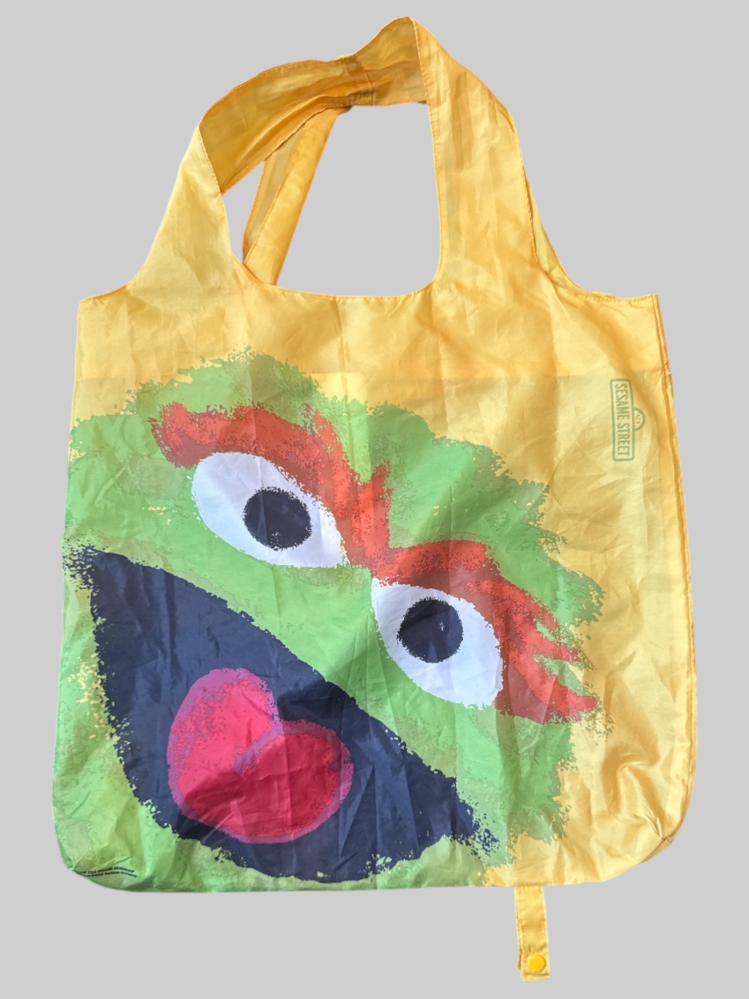 Foldable Oscar the grouch from Sesame Street bag