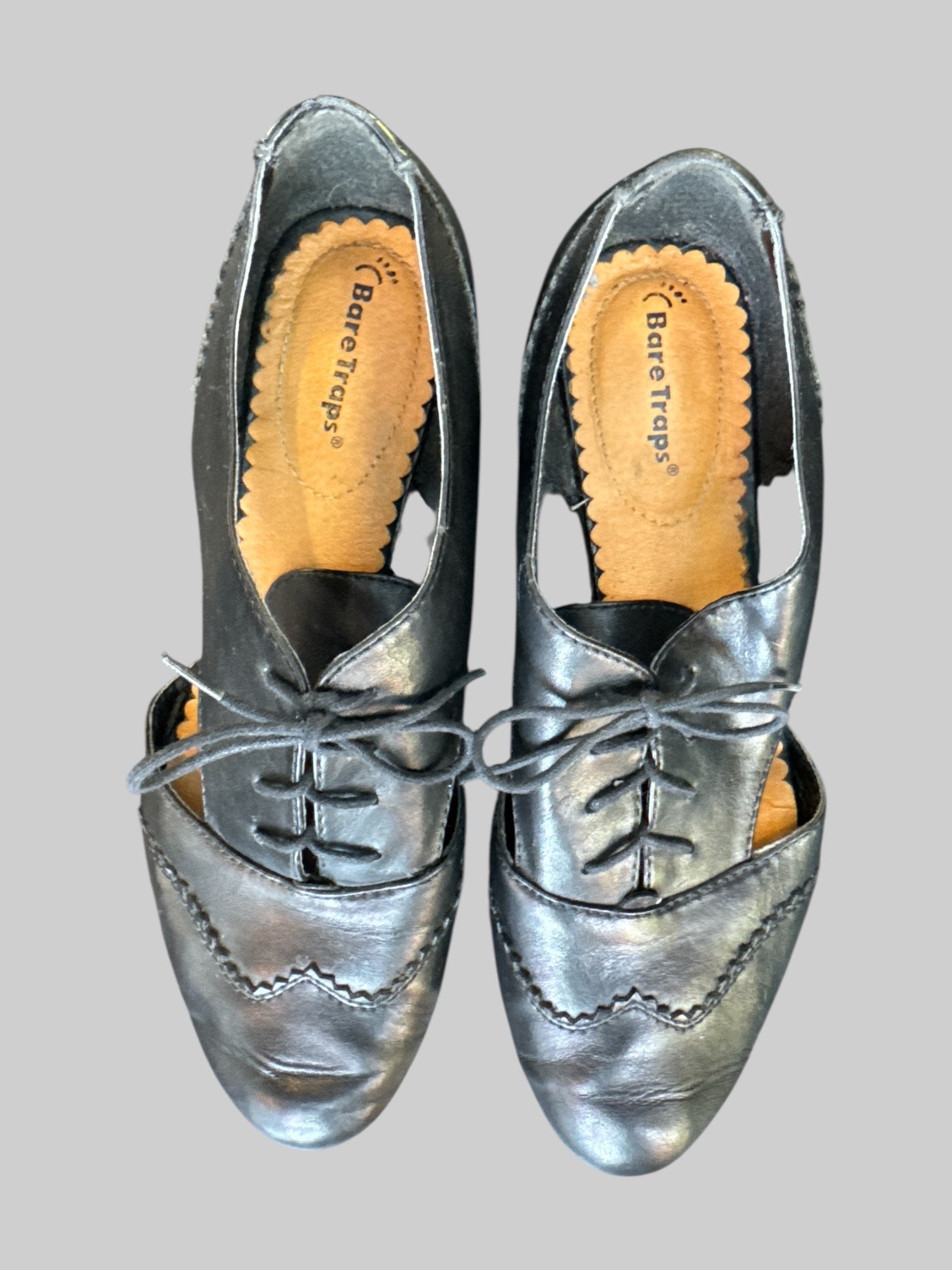 Size 9.5 black shoes with cutouts