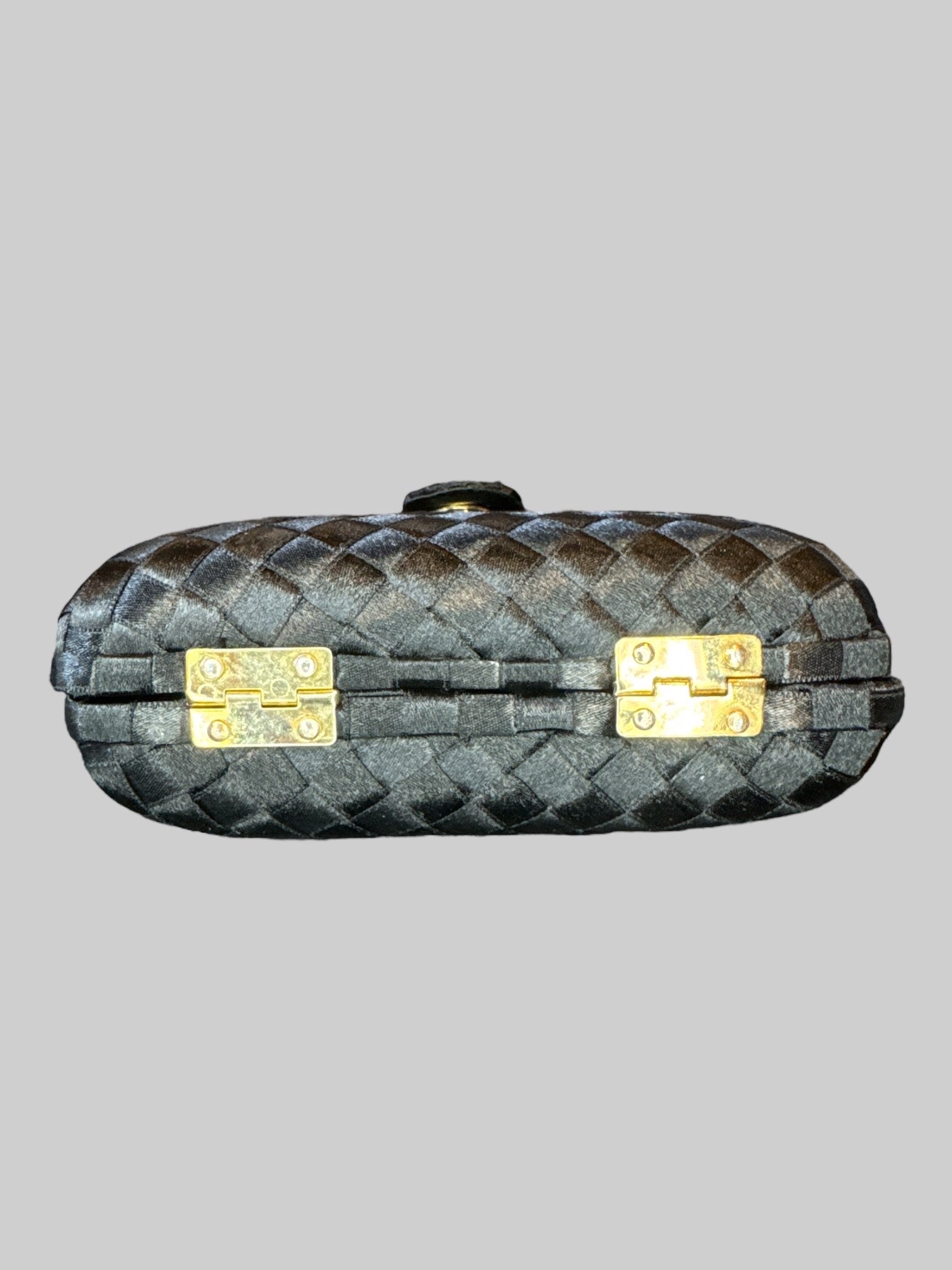 Vintage black woven purse with braided shoulder strap, snap button claspe, and multiple pockets