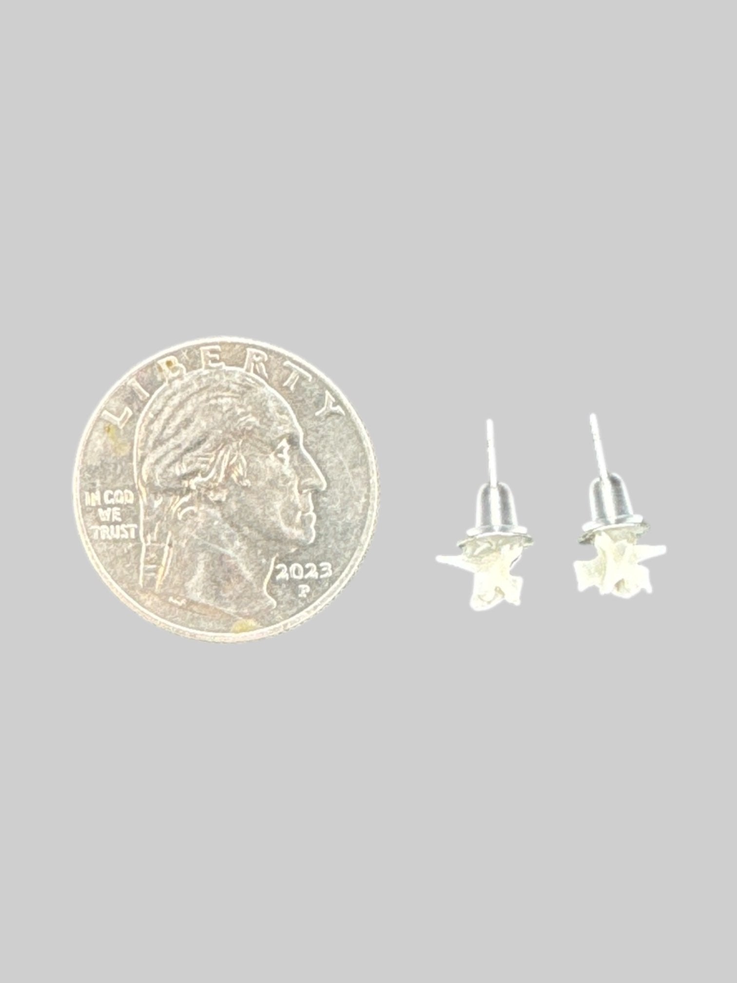 Small white snake vertebrae earrings