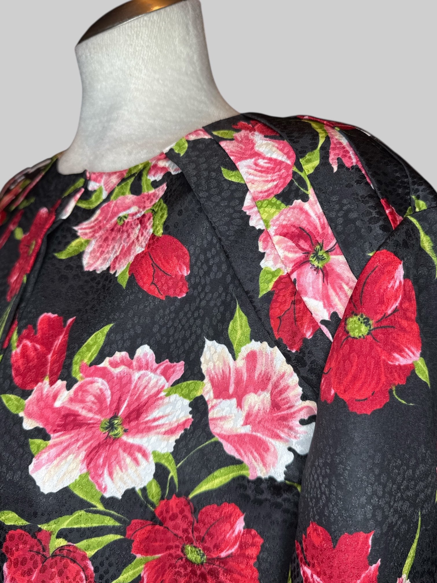 XL Vintage black textured button up top with pleating on shoulders and red, pink, and green florals