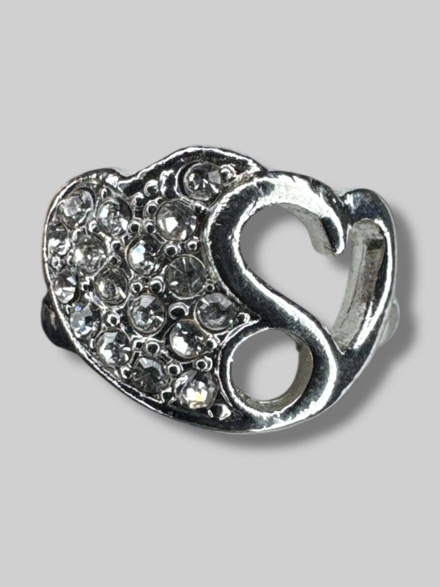 Size 7 Silvertone ring with heart design and bedazzling