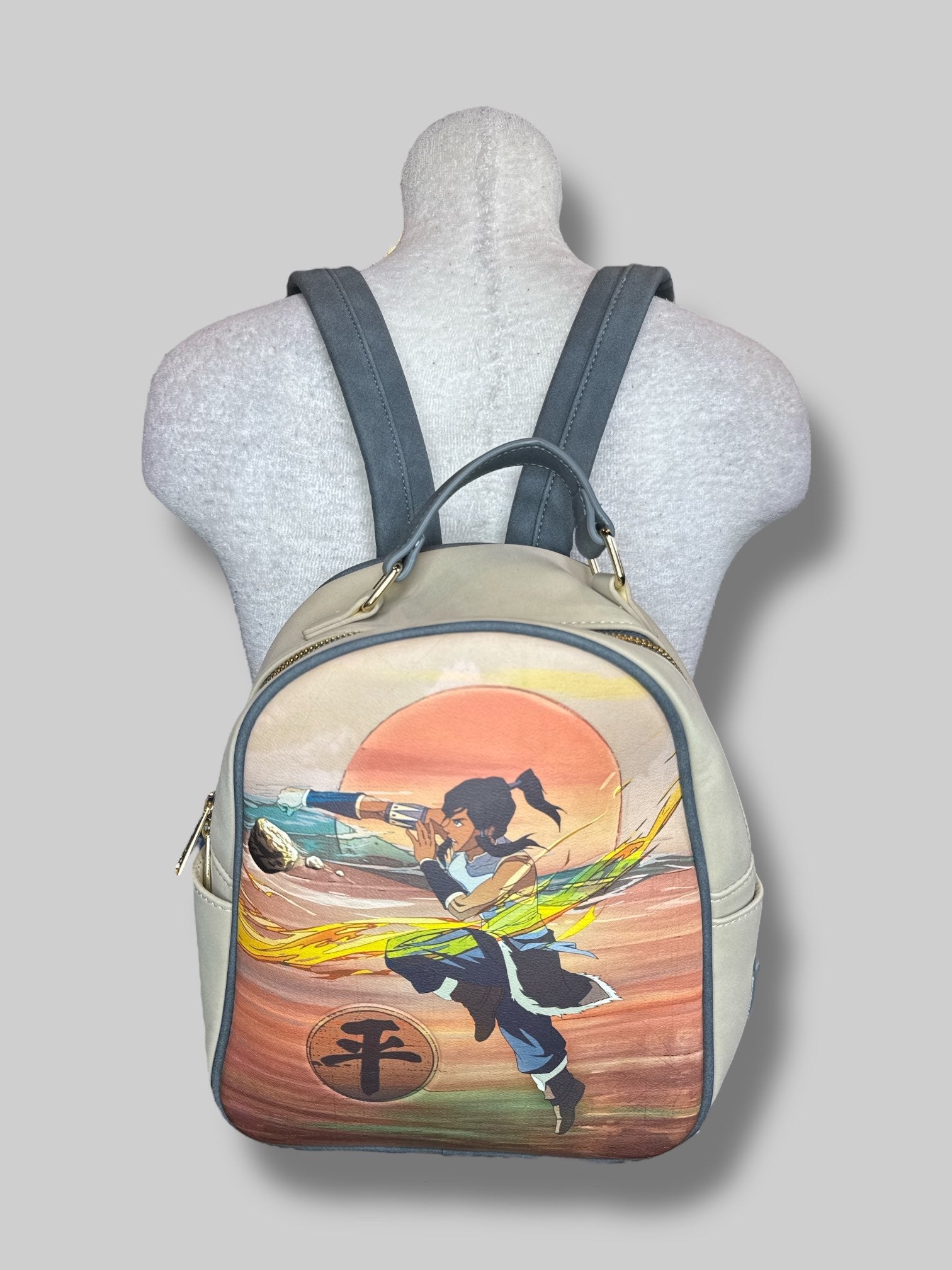 Avatar Legends of Korra lounge fly backpack with zipper pockets inside and out, and design on back