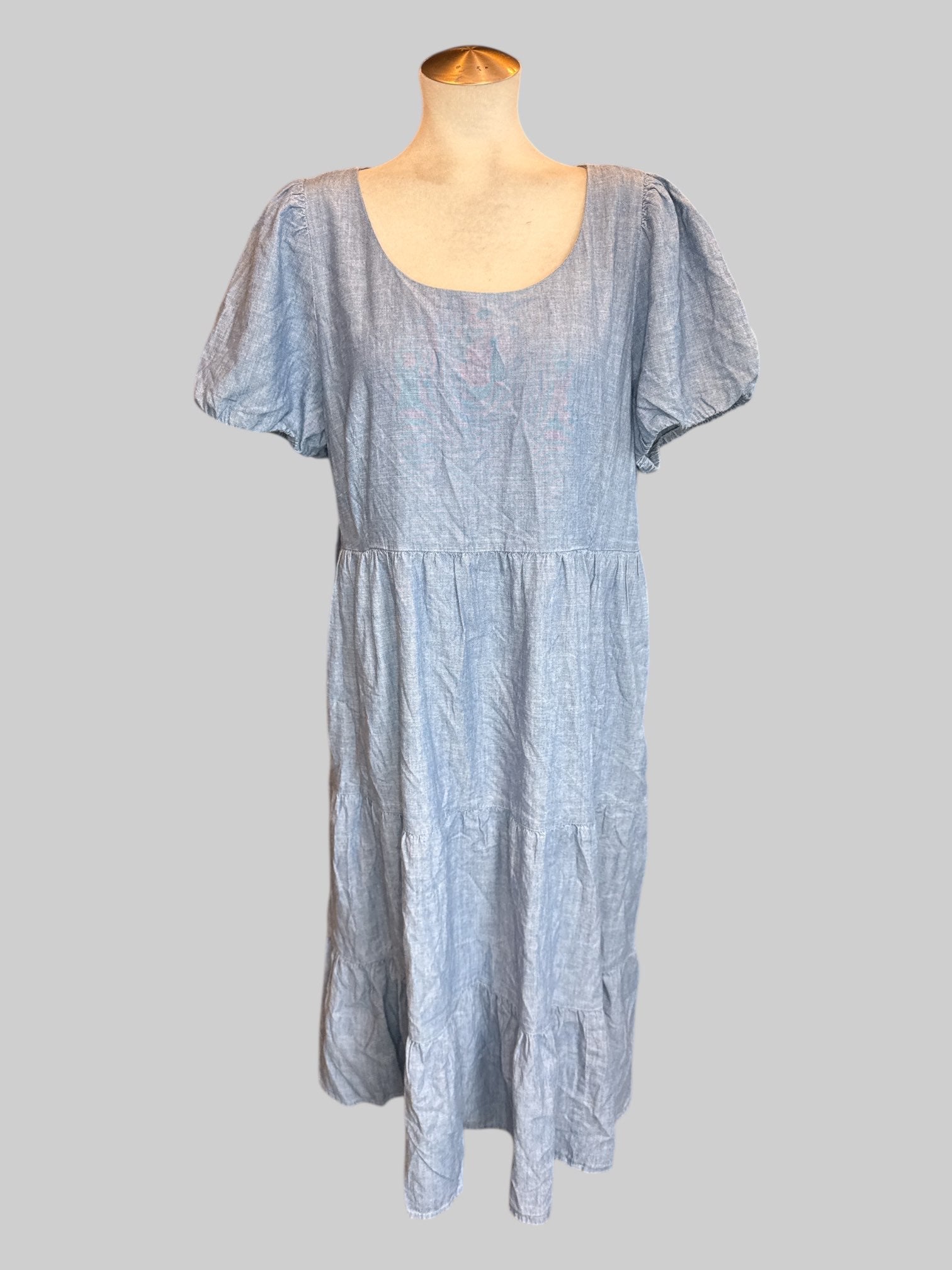 1X Blue denim short sleeve dress with balloon sleeves, pockets, and tiered skirt