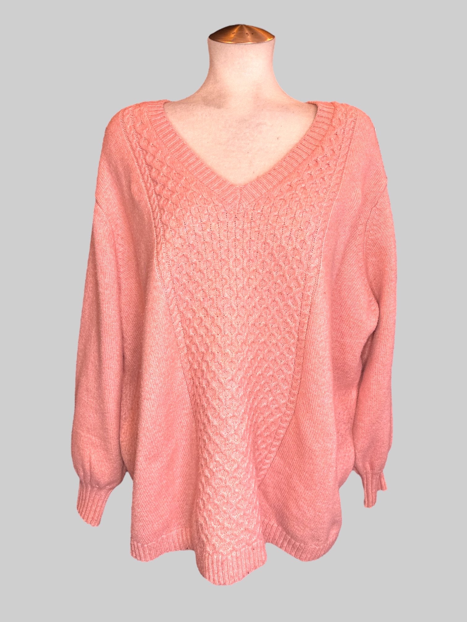 6X Pink knit sweater with crisscross design on front and cuffs