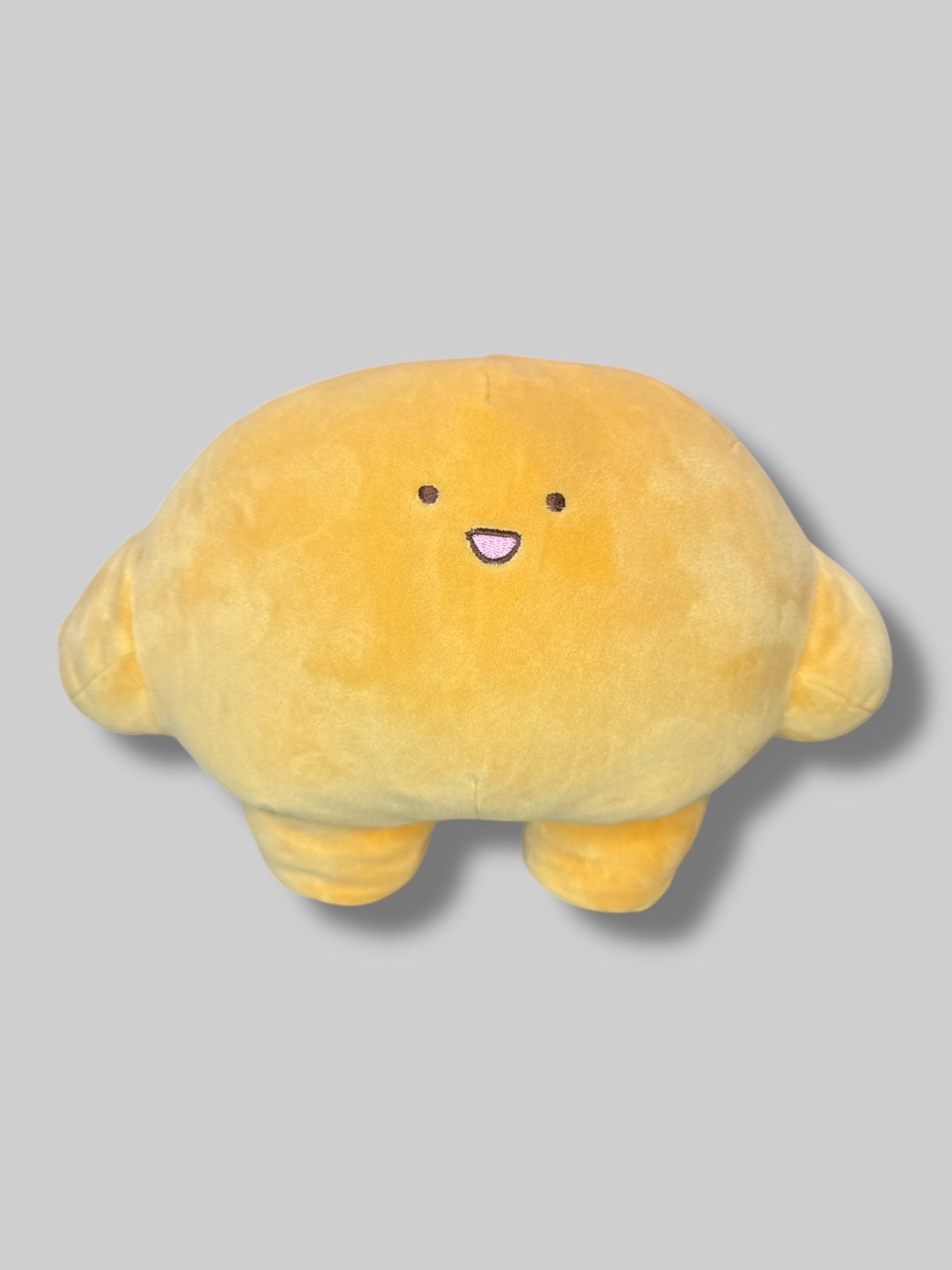 Orange cute little squishy guy plush