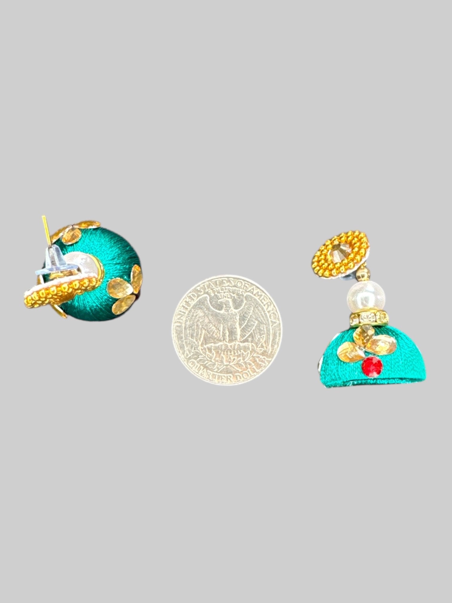 Green and gold earrings with detachable, pendants, and bedazzling