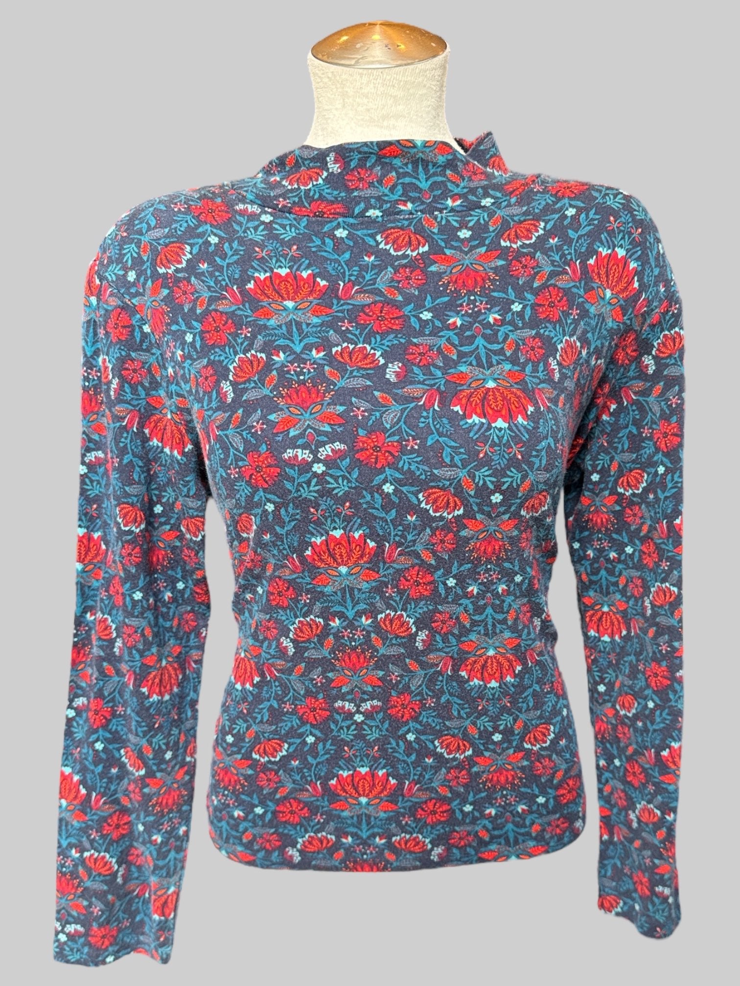 0X Blue turtleneck with blue red and orange florals