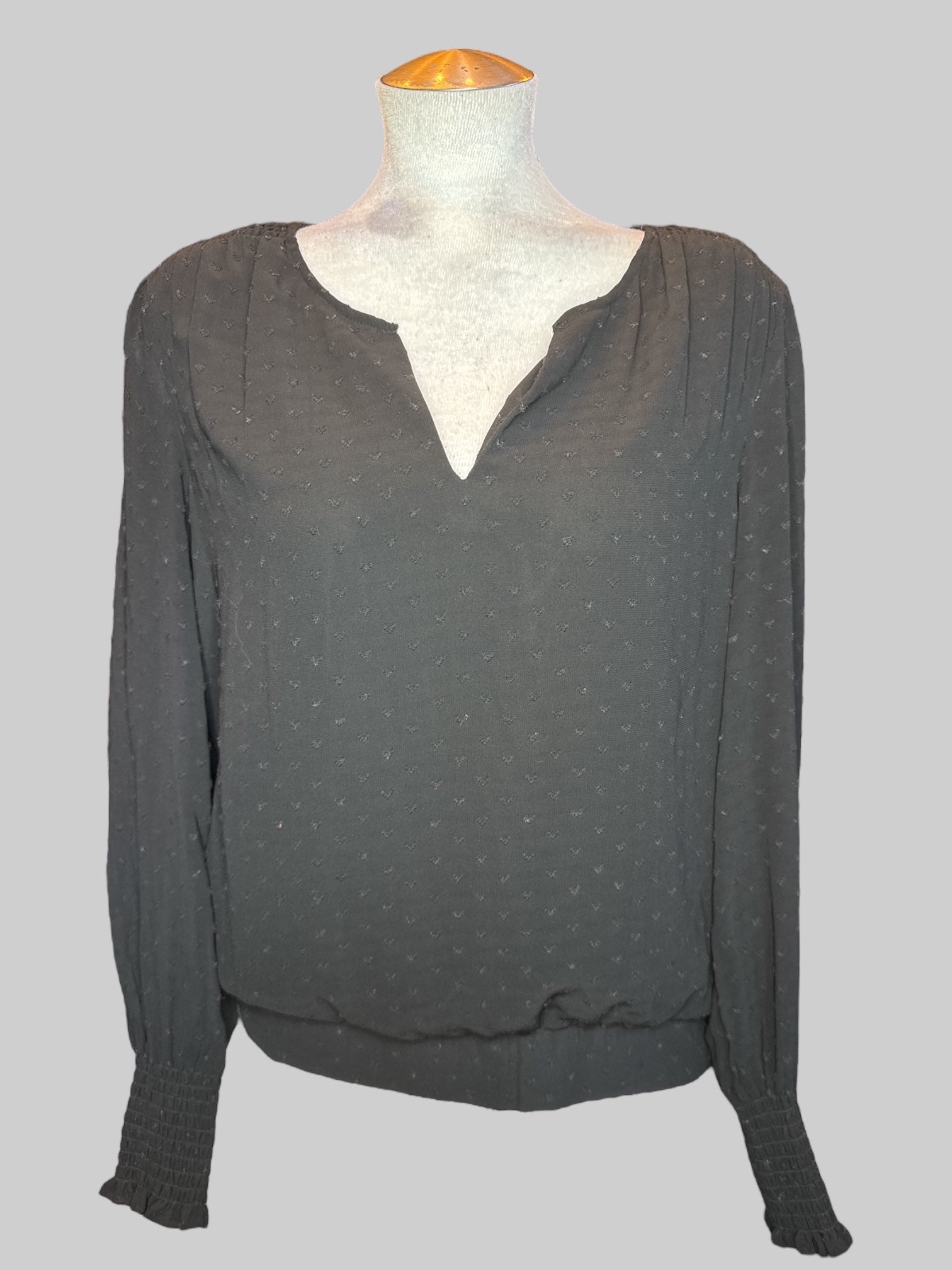 M Black blouse with heart shaped textured polkadots, sheer sleeves, and balloon hem