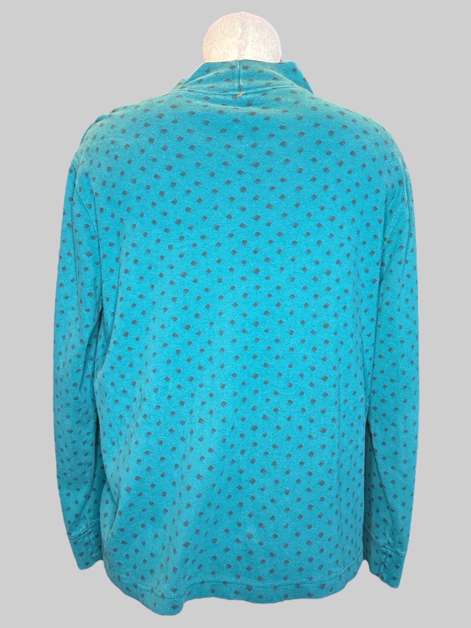 0X Blue turtleneck with brown spots