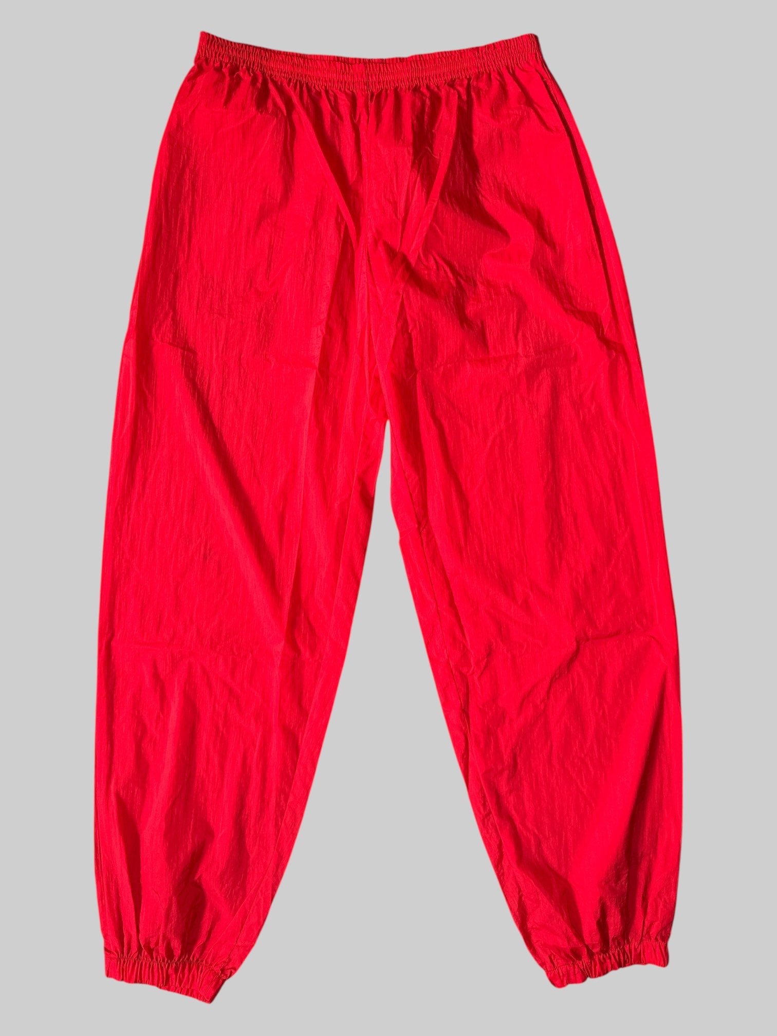 0X Vintage Marlboro Adventure Team red track pants with zipper pocket on back, and stretchy waist with withdrawal string inside