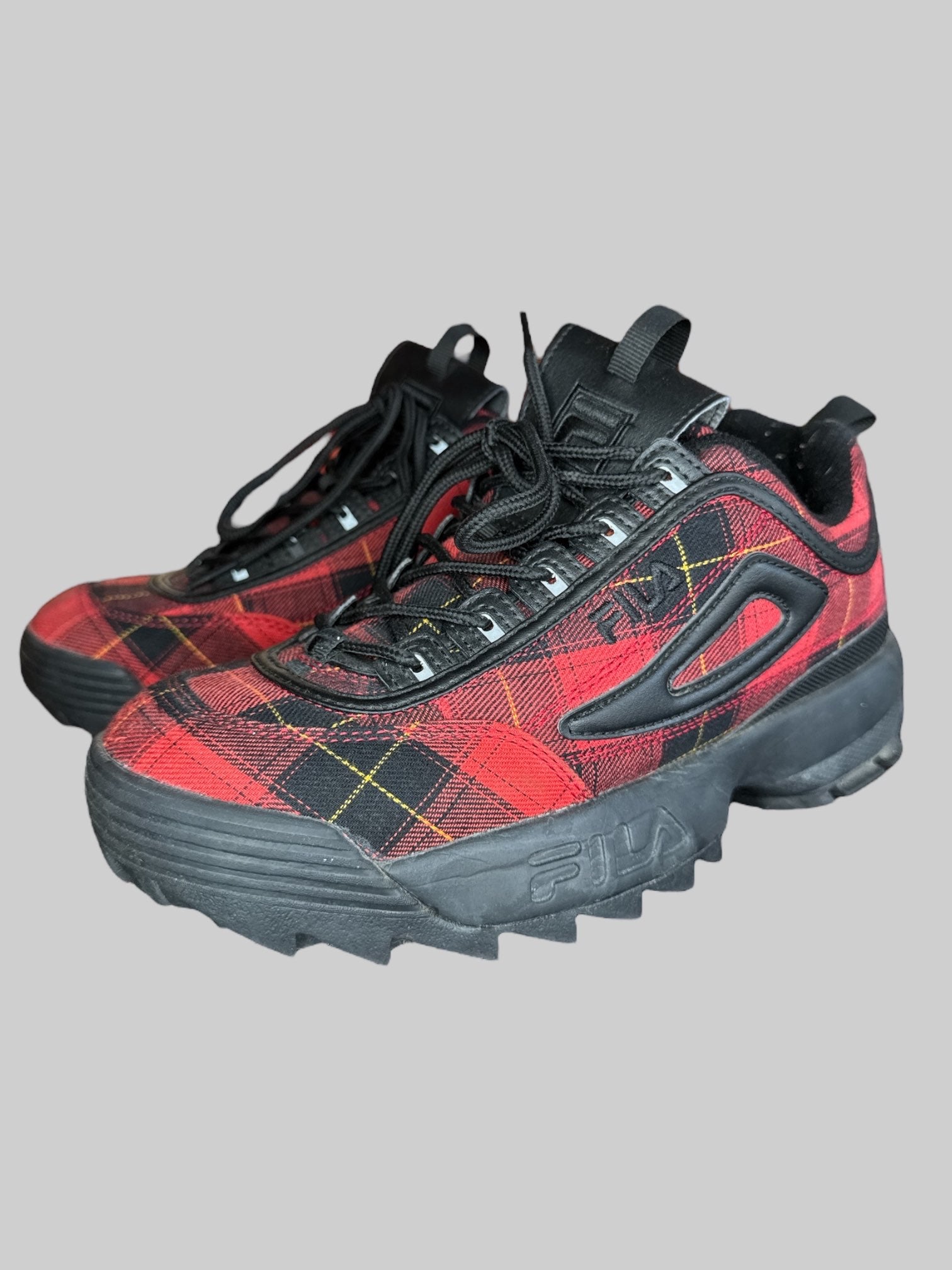 Size 8.5 black red and yellow plaid Fila sneakers